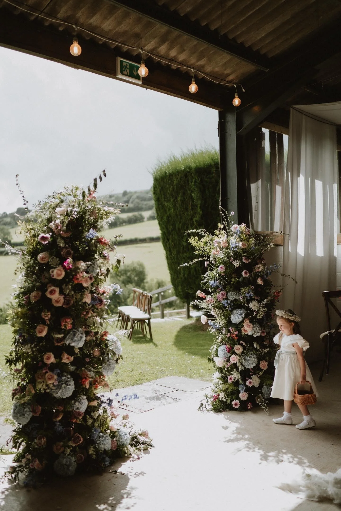 Floral pillars at Sugarloaf Barn.jpg