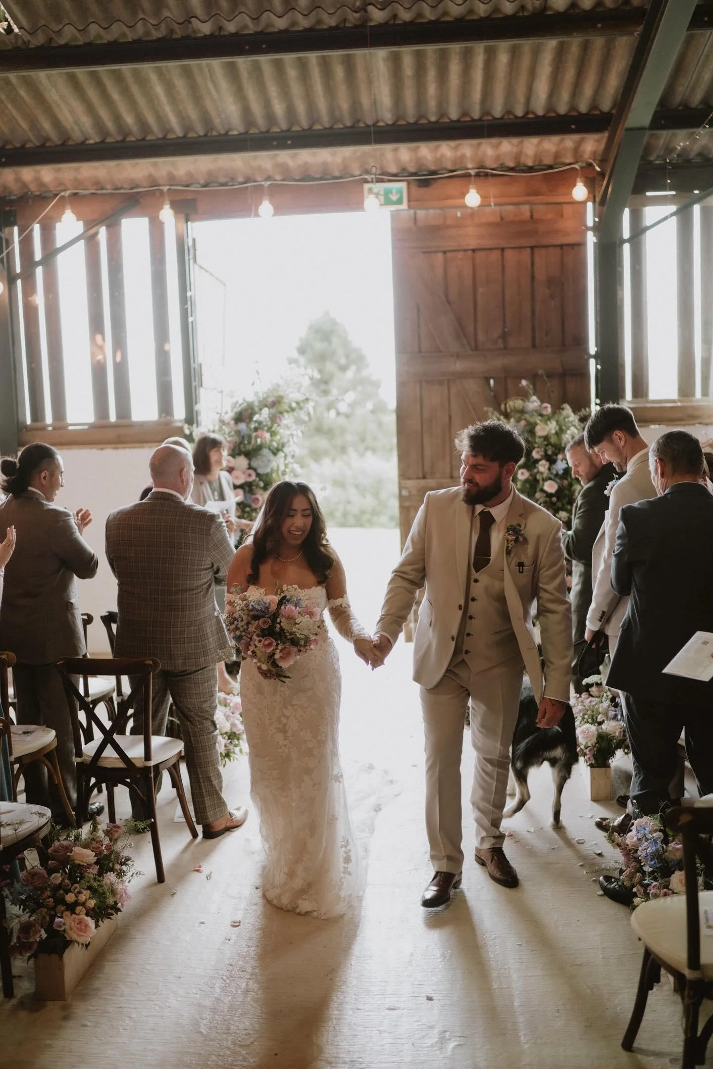 Walking down the ailse at Sugarloaf Barn.jpg