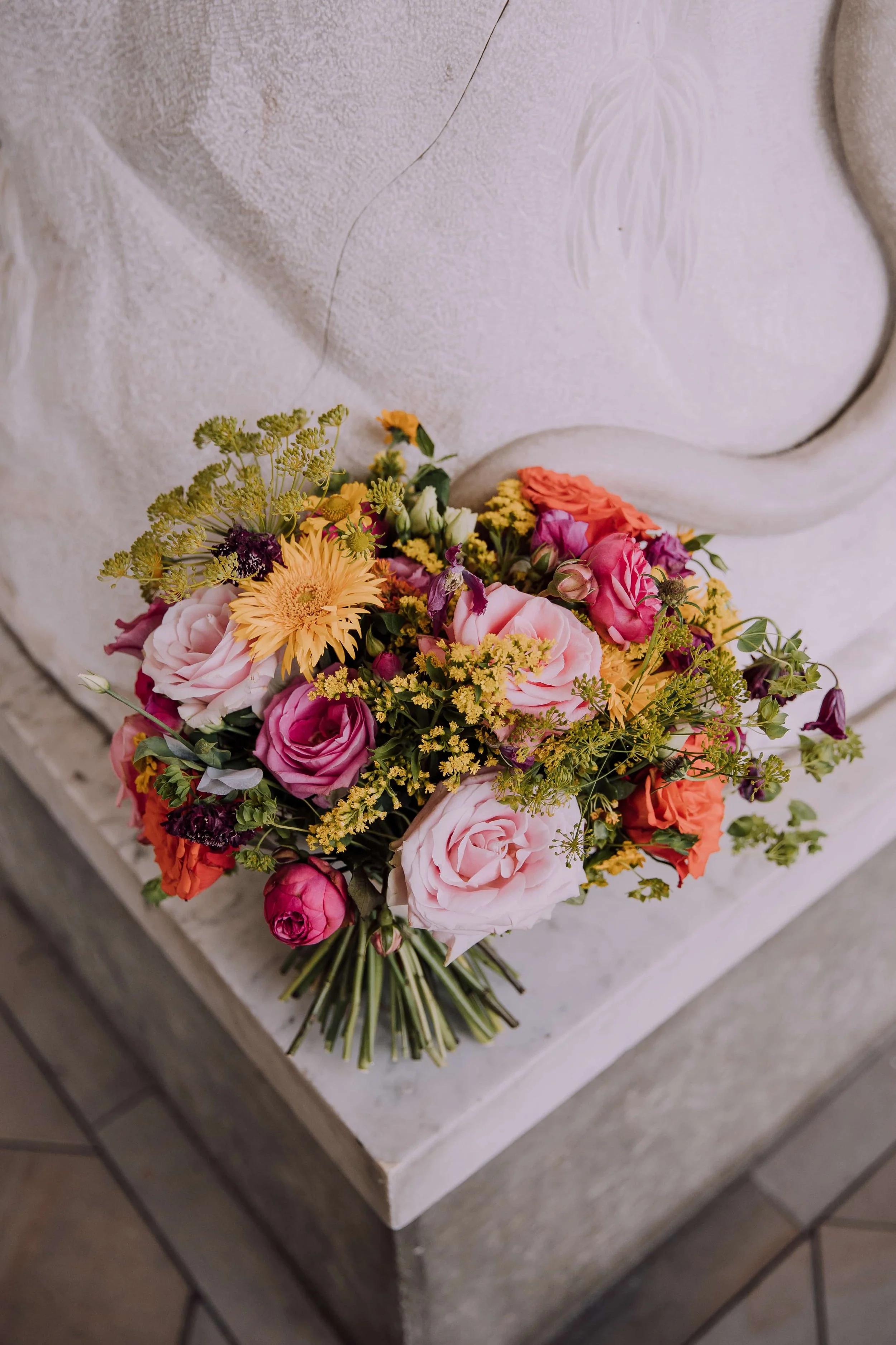 Colourful summer wedding flower bouquet at Margam Orangery.jpg
