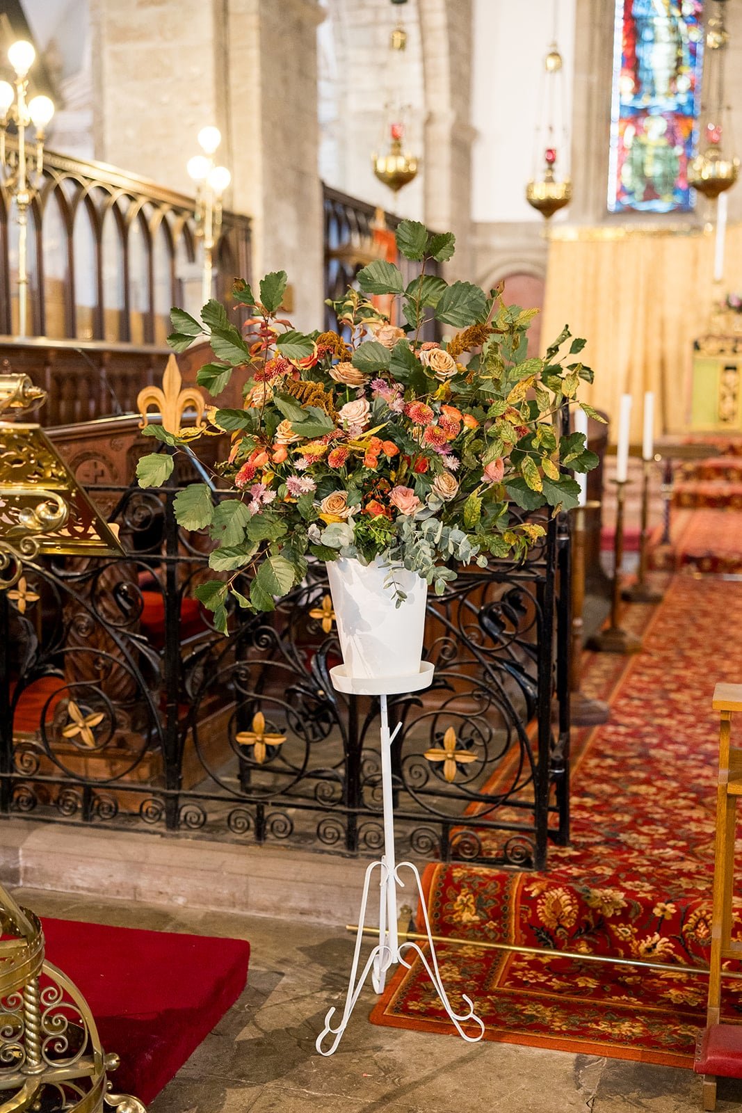 Pedestal flowers for church wedding in caffeine colours.jpg