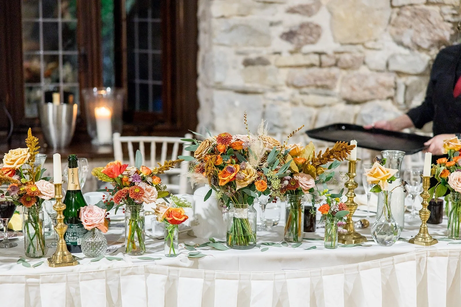 Top table wedding flowers in caffeine tones.jpg