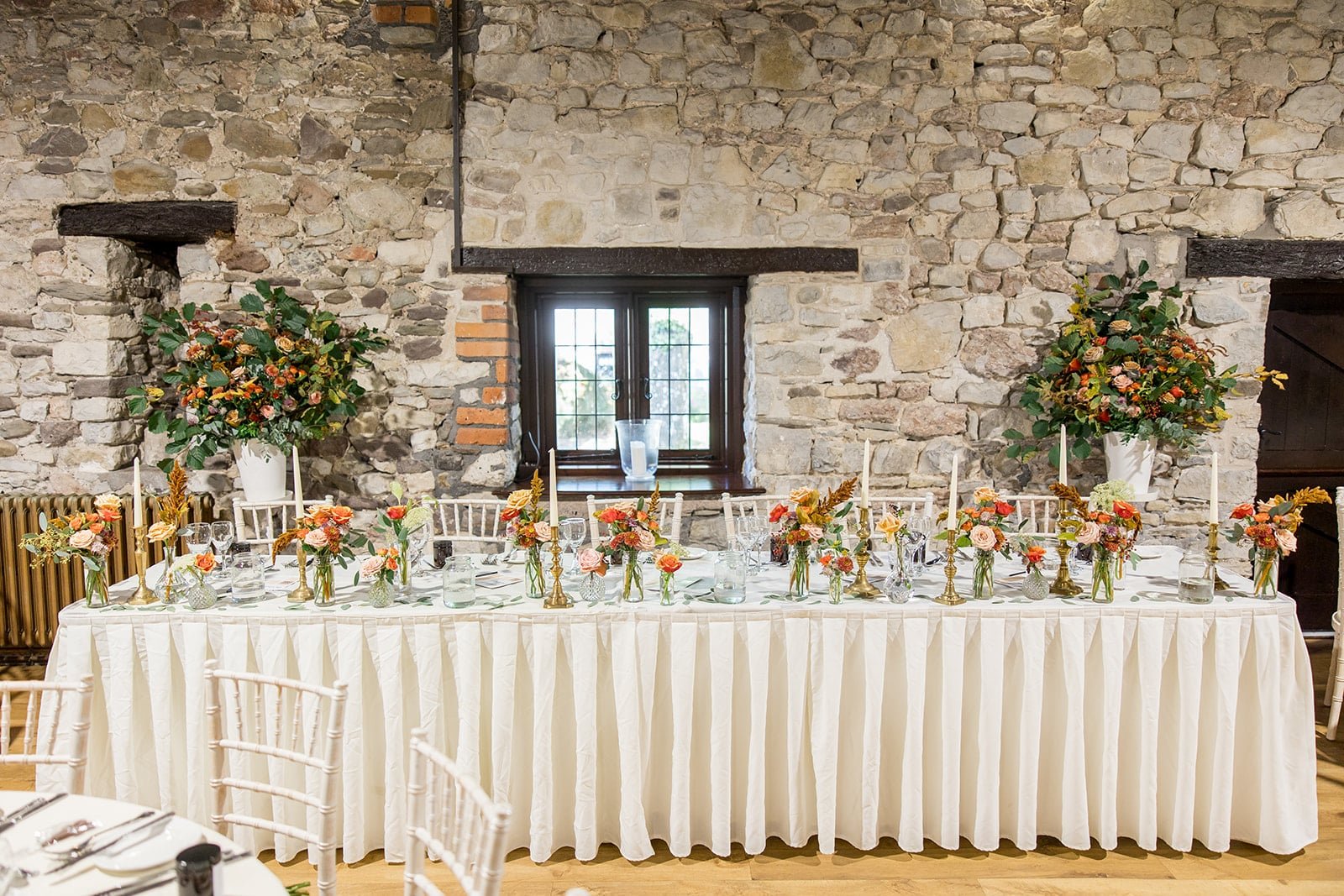 Wedding reception top table caffeine wedding flowers.jpg
