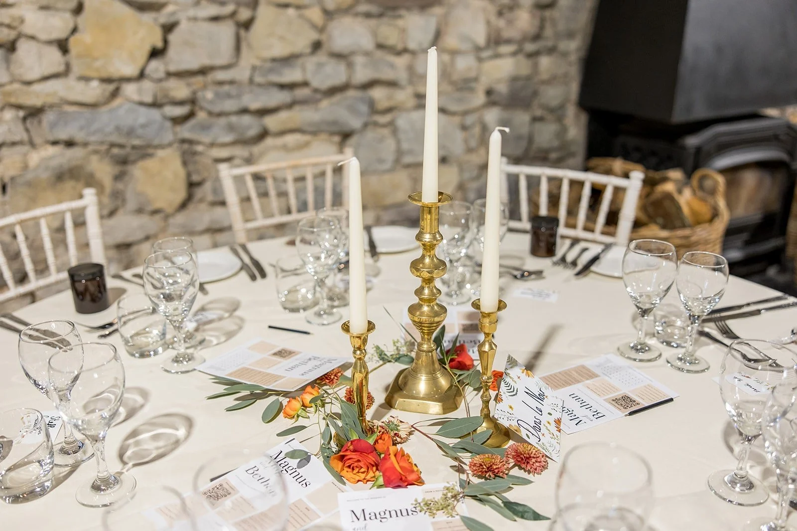 Brass candlesticks simple wedding centrepiece.jpg