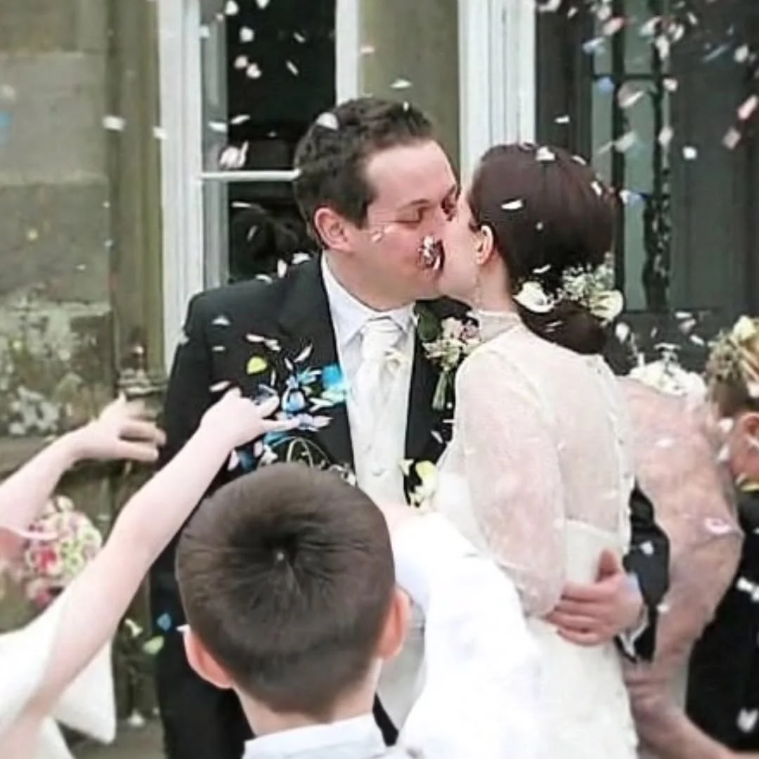 Twenty one years later.
A little more grey, a little more worn, not any wiser 😜

Fun fact, I was never that bothered about being married. I would have happily lived in sin for ever. We were together for ten years before we got married. We have grown