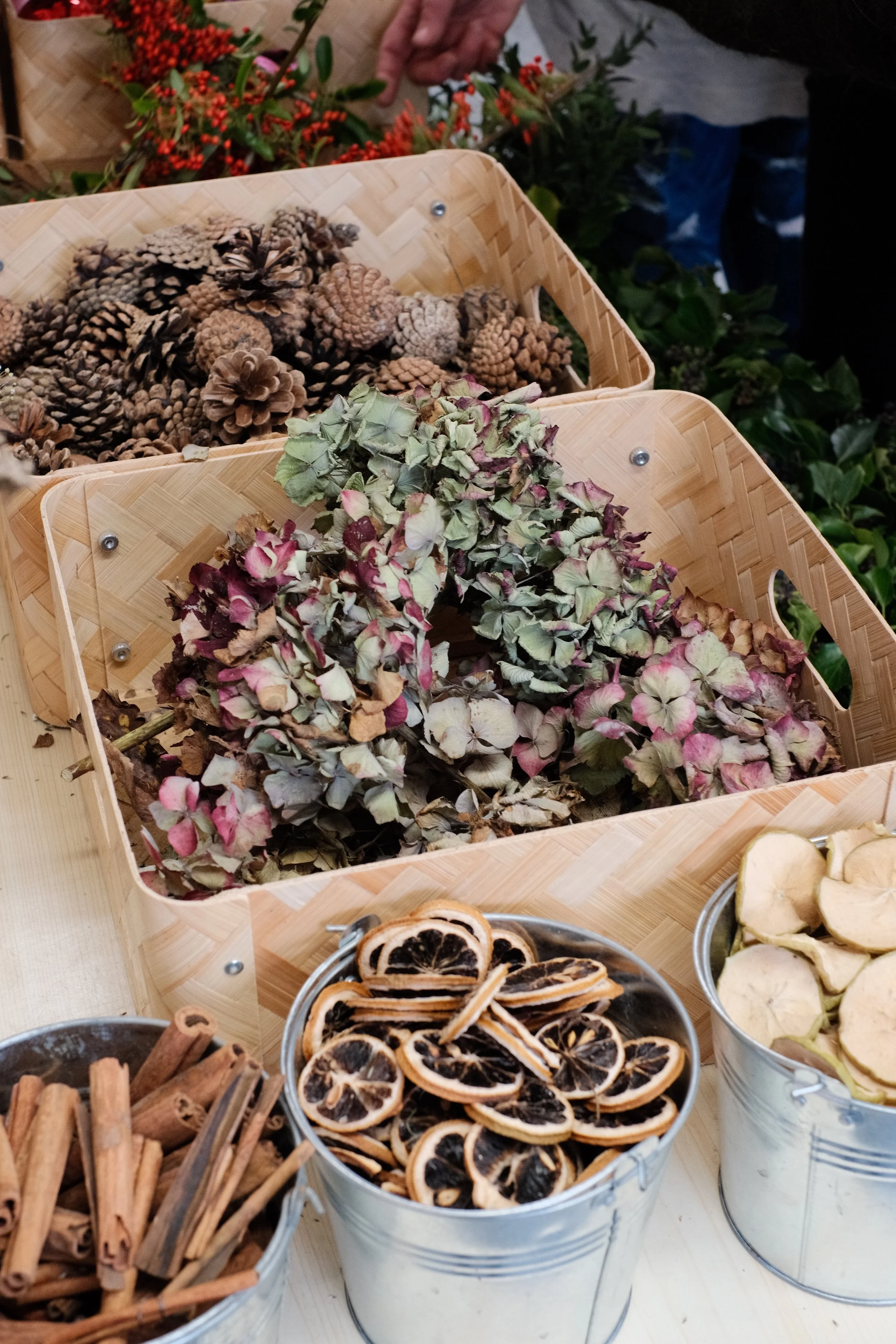 Boxes of decorative items for Christmas wreath class Cardiff