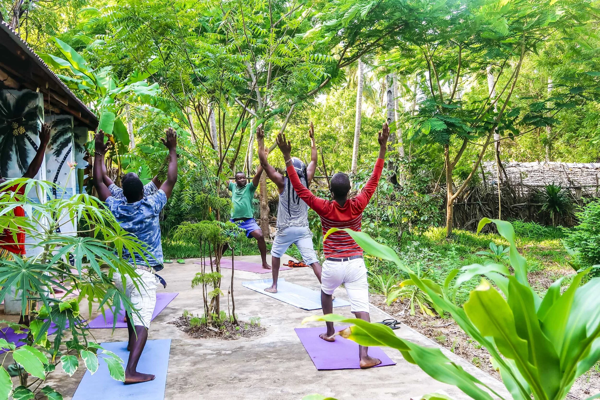 Nicodemus of Treehouse teaching the weekly community yoga class