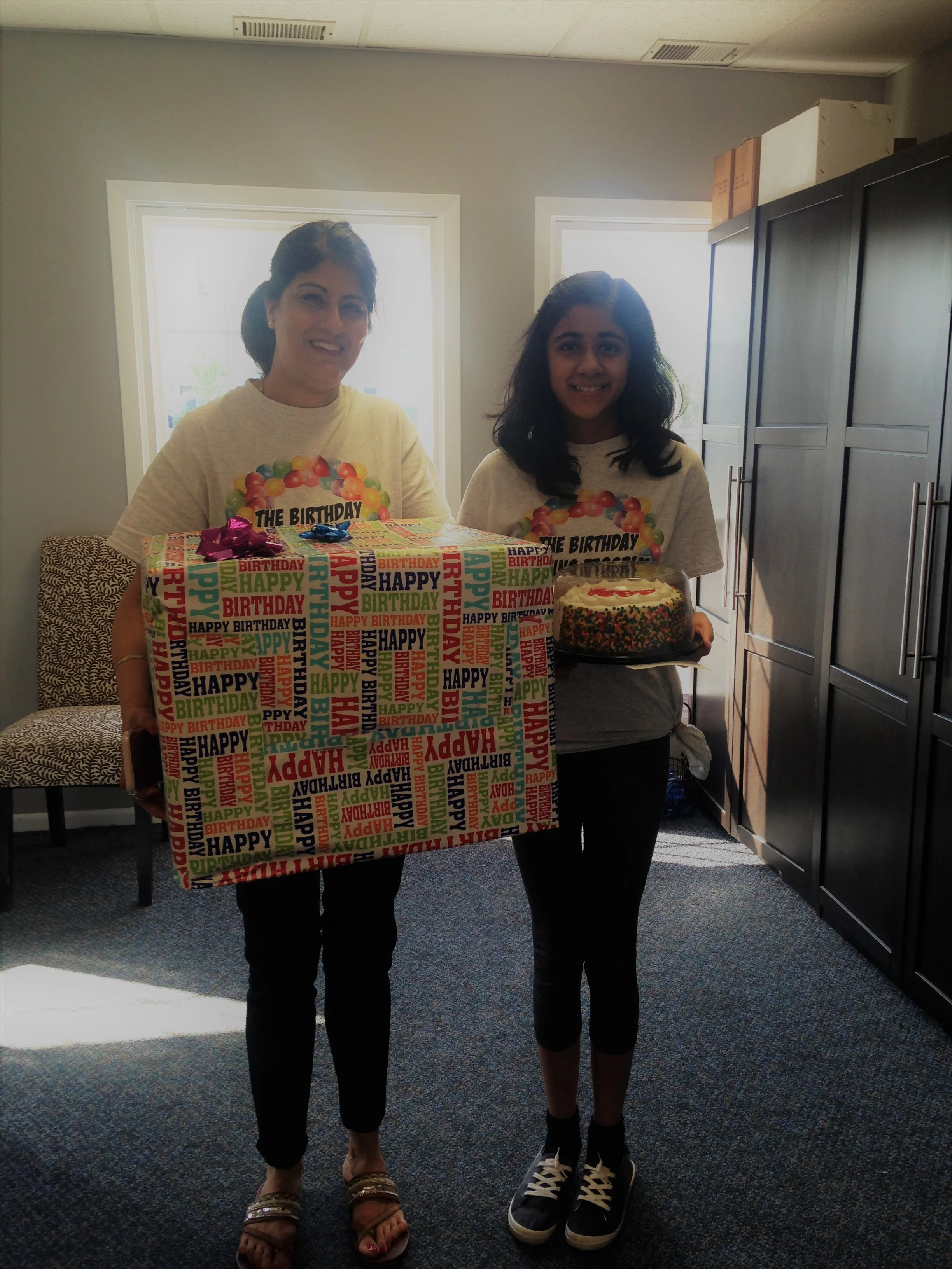 Sonika Menon , right, and her mom Anna with a birthday box