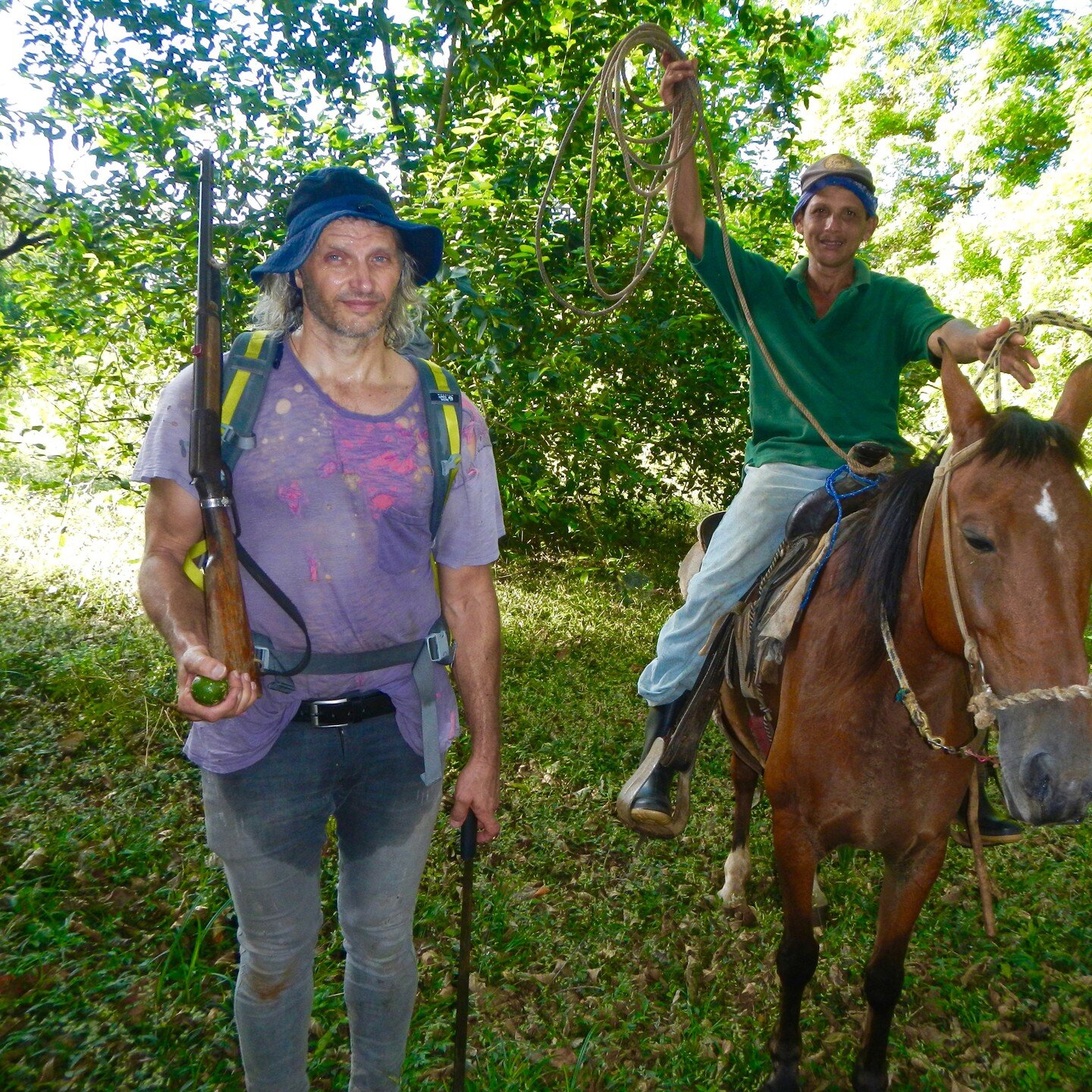 I was handed the rifle and told, watch for wild pigs, shoot if they come at you! By the way....I did not piss my pants... tat is indeed sweat. Just to add... that no one that I know can challenge me with my talent for knowing what plants to eat anywh