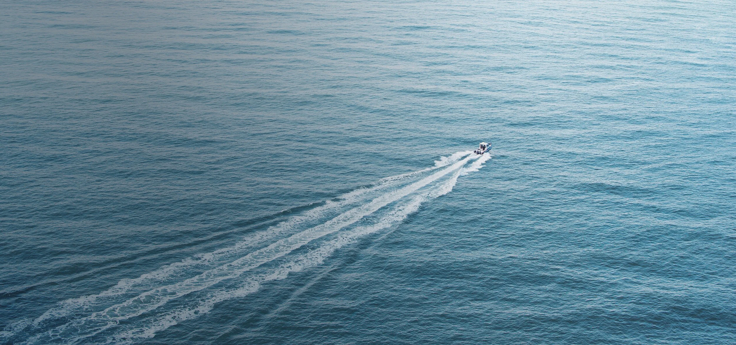 BoatDrivingOffWeb.jpg