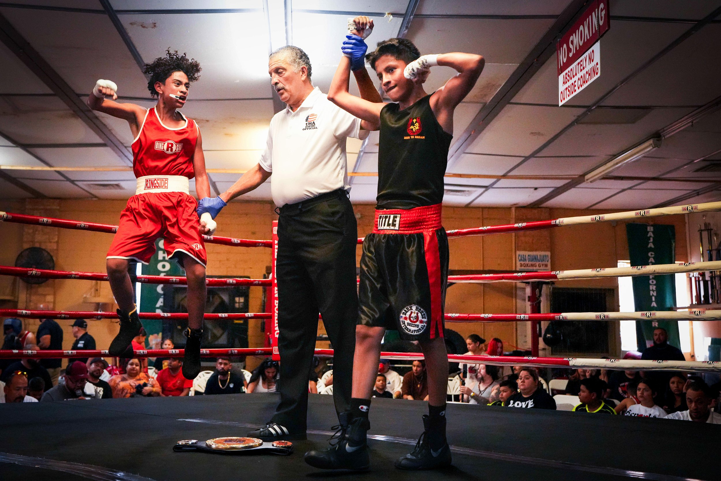 Julian Robles of Diamond Hill (left) reacts as Gabriel Gomez of Dark Horse Boxing is announced the winner of their bout during a boxing tournament celebrating the 30th anniversary at Casa Guanajuato on Saturday, Sept. 14, 2024, in Dallas.