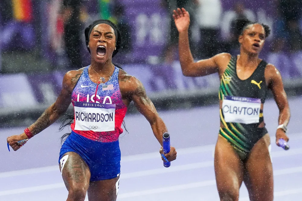  Sha'carri Richardson of the United States crosses the finish line to win the women's 4 x 100 meters relay final at the 2024 Summer Olympics on Friday, Aug. 9, 2024 in Saint-Denis, France. 