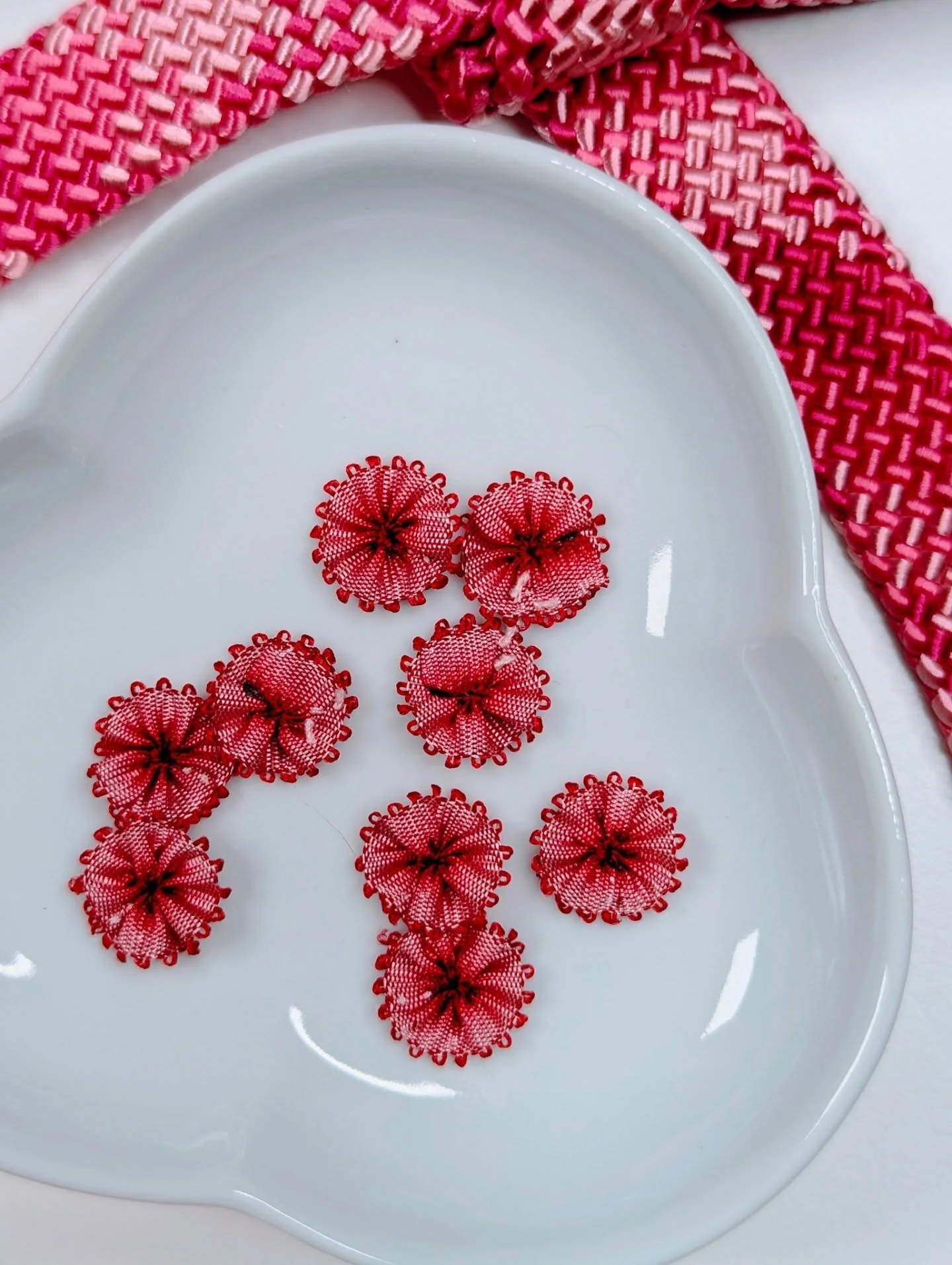 Think pink&mdash;and red.  Barbiecore meets Y2K nostalgia to showcase bold reds and fuchsia clashing playfully with soft blush and powder pinks for a vibrantly fresh aesthetic.

#mokubaribbon #trimshop #ribbonshop #pinkandredaesthetic #trendingcolor