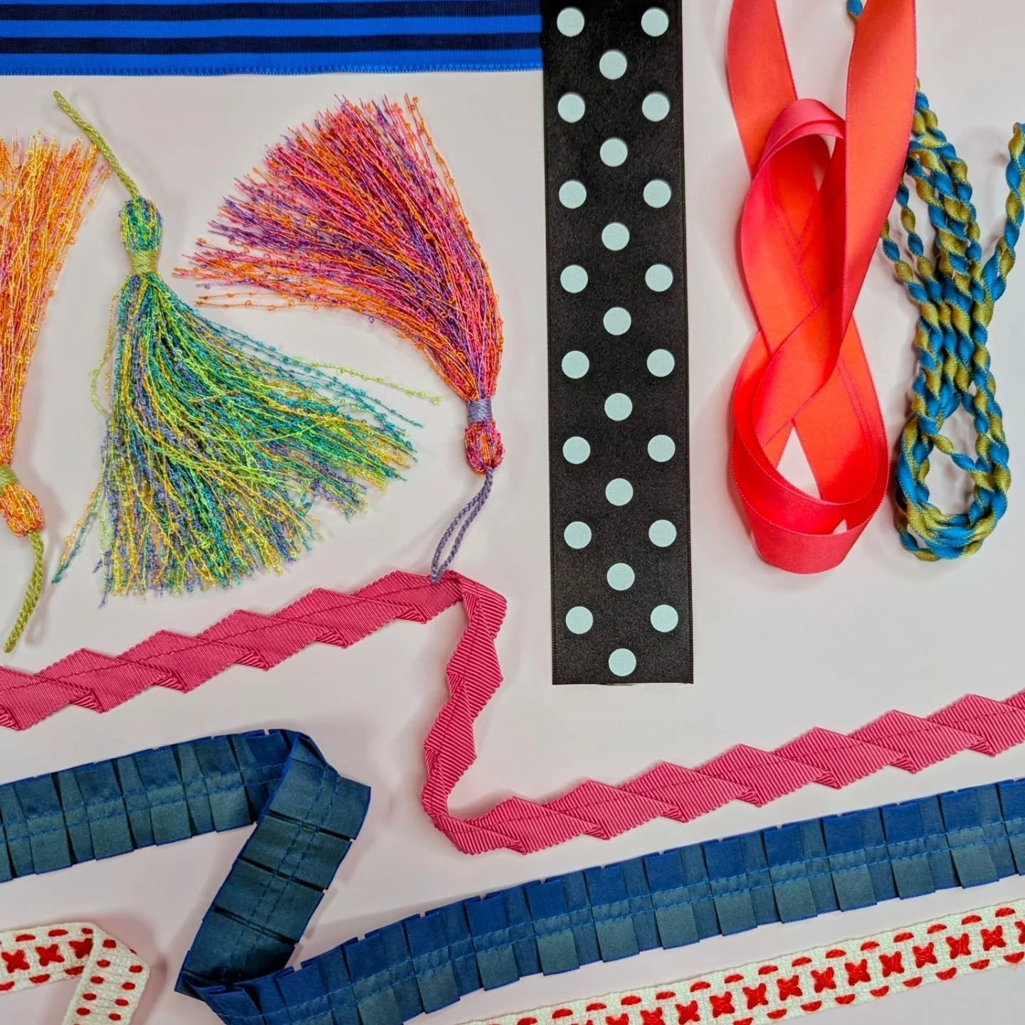 Give a nod to a more maximalist (and fun) sensibility and bid farewell to quiet luxury.  Strike an experimental  balance between bold and refined elements for SS26 - classic dots and dashes thrive alongside fringe, tassels, volume, vibrant colours an