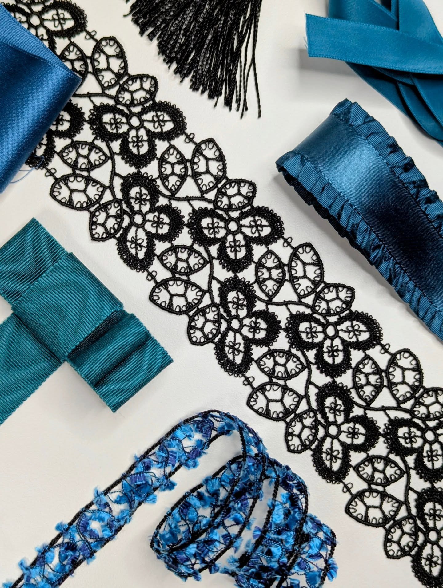 Blending dark blue with aquamarine-green creates a hue that balances depth and freshness.  Blues and darks continue to steal the spotlight and, as a colored dark, teal provides a richly versatile alternative to black.

It's also gender-inclusive and 