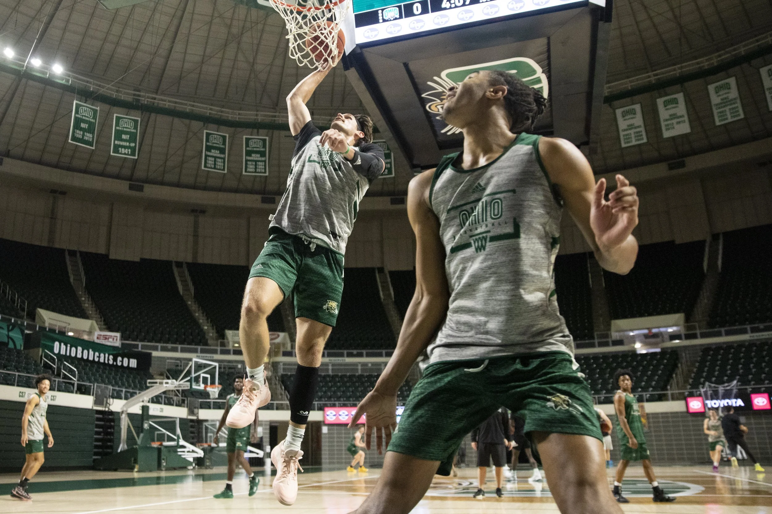  Ben Vander Plas (5) receives an alley-oop pass from Sam Towns (11) during a drill. The bond between the teammates created a photo that is resemblant of the famous alley-oop photo with Dwayne Wade and LeBron James.  