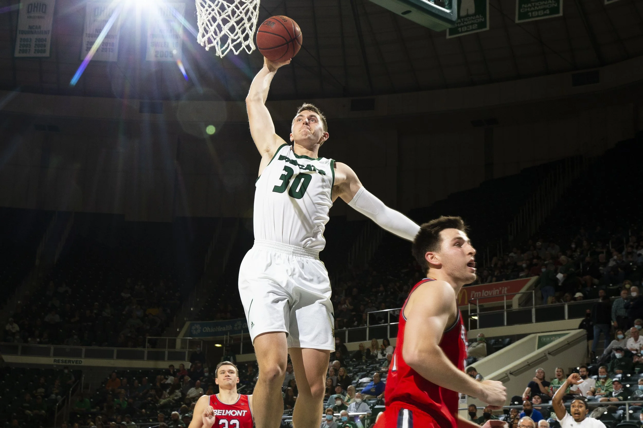  Jason Carter drives through for a slam dunk in the second half of the Belmont game.  