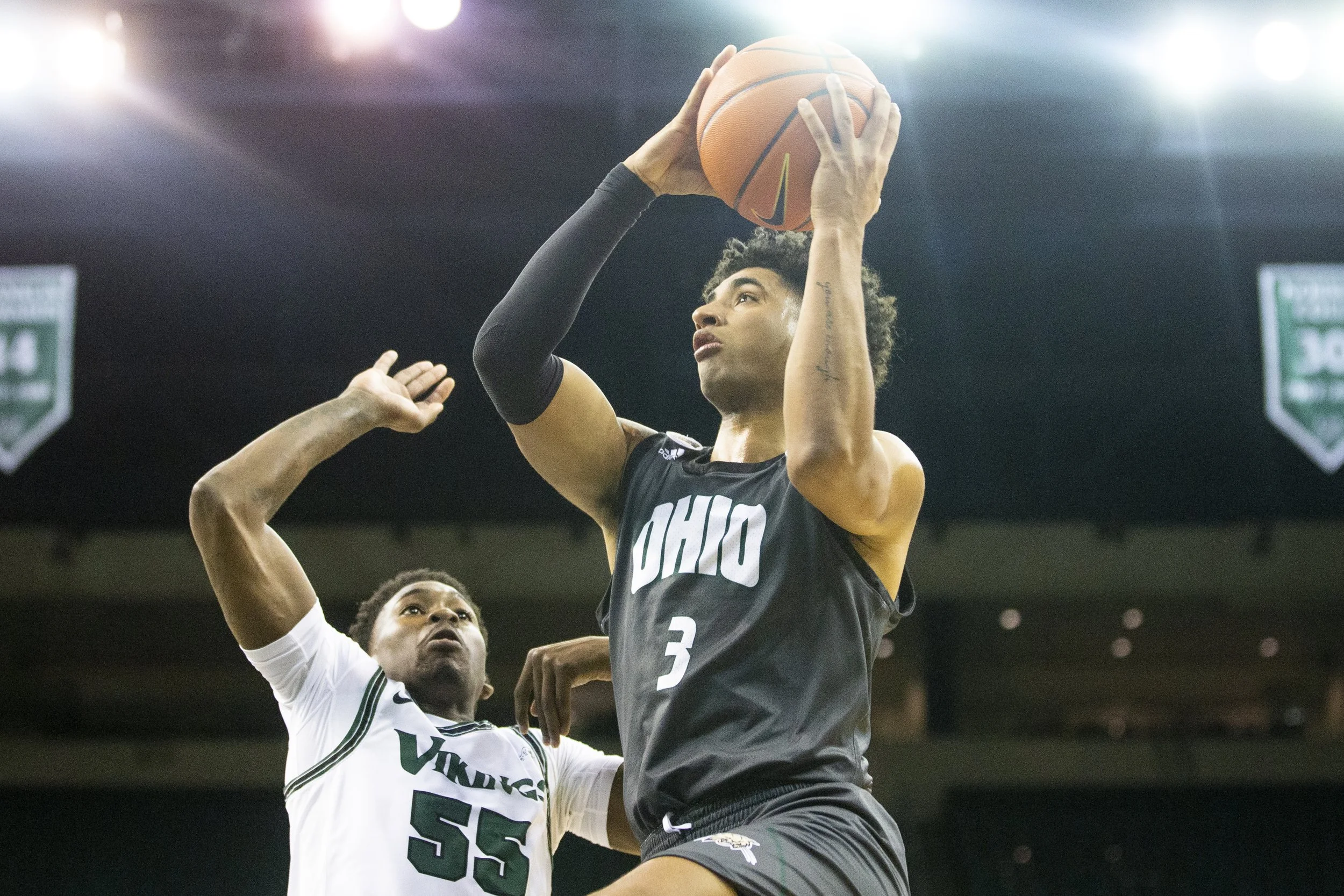  Ben Roderick goes for a contested layup during the game against Cleveland State. The Vikings play a chippy style of defense that caused the Bobcats to get physical down low in the paint.  