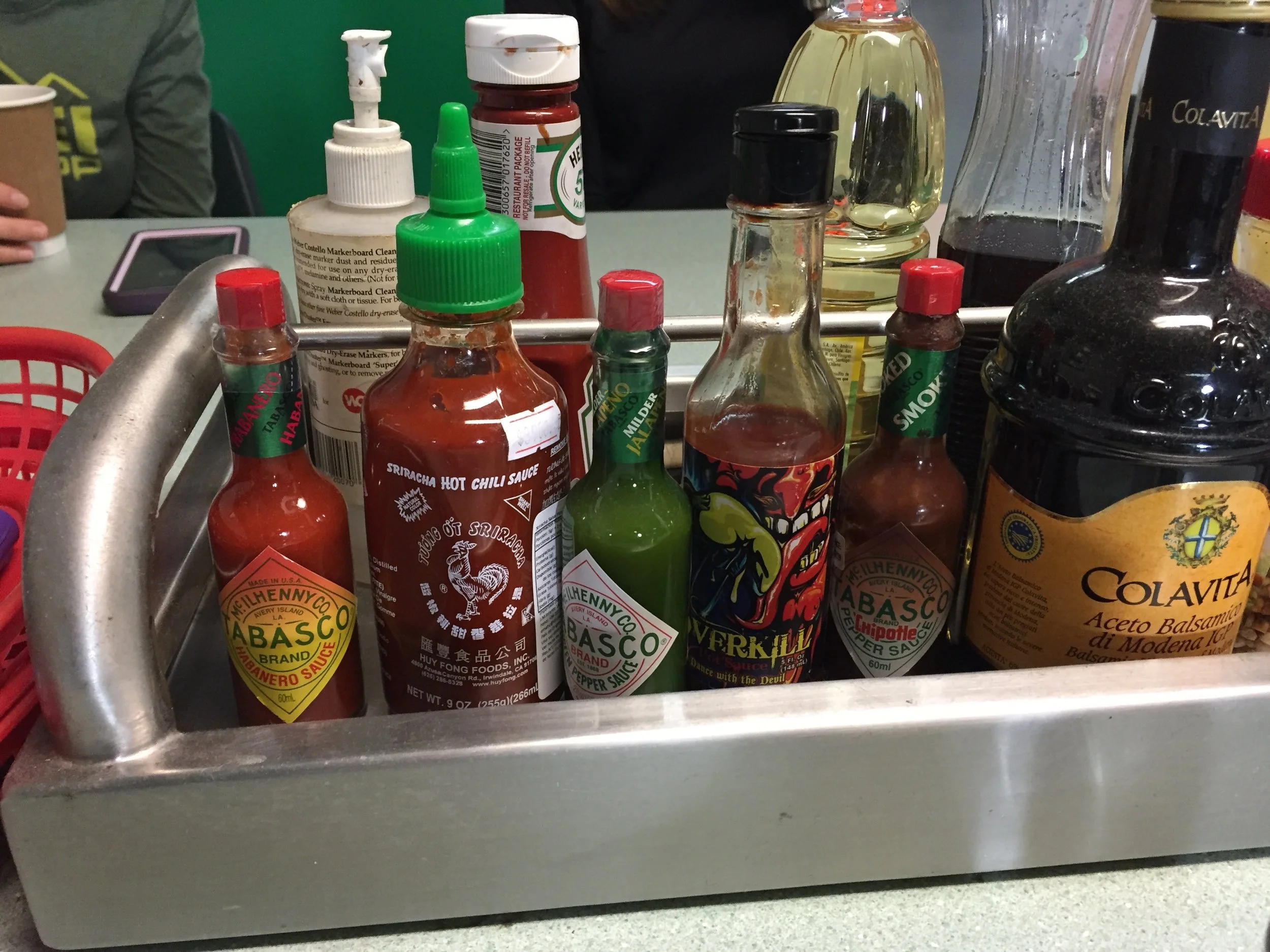 The silver diner-like atmosphere is quite comfortable, with each table providing at least 20 different sauces, condiments and spices to accommodate most palates.