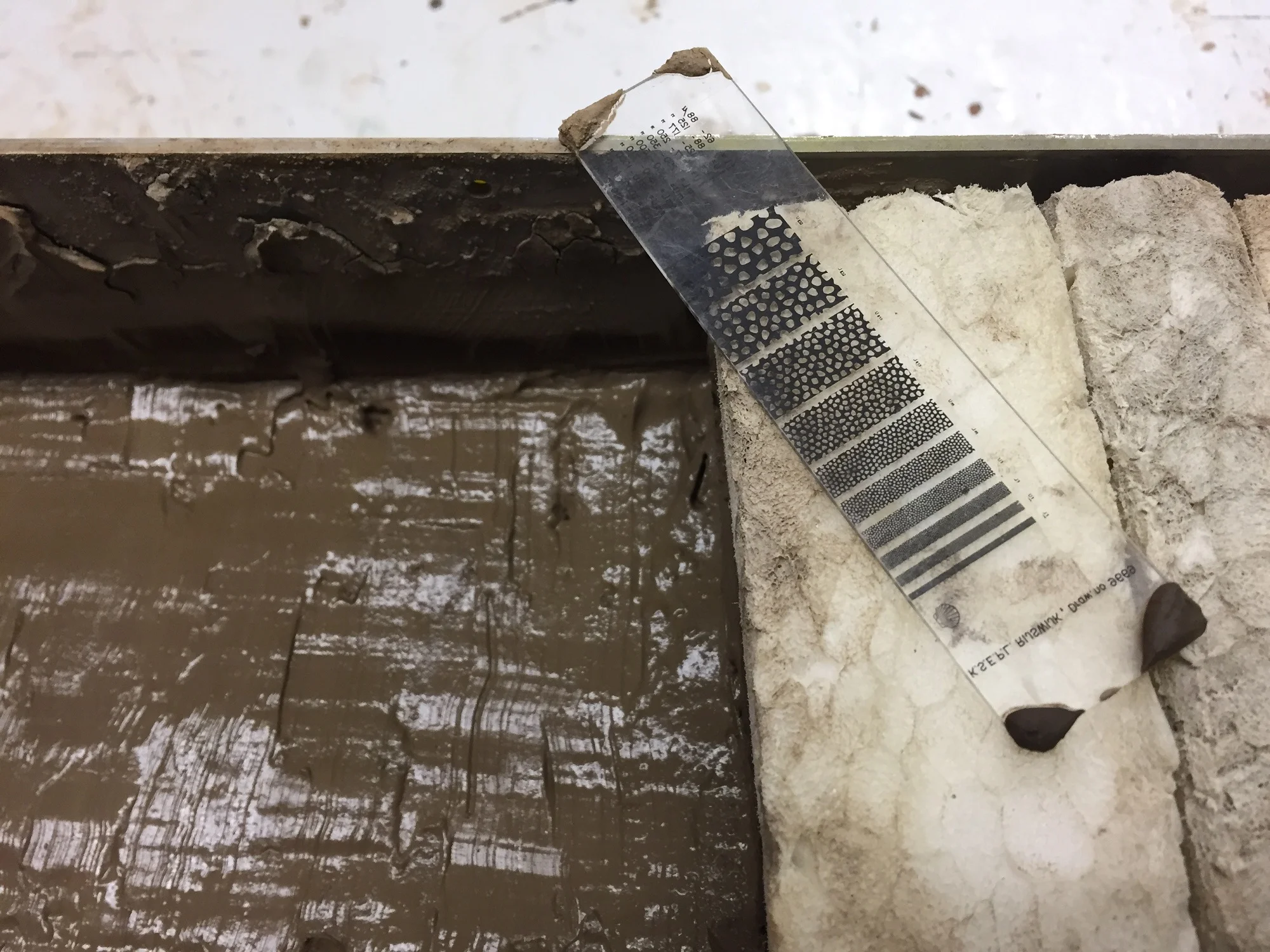 Becky Minzoni uses the grainsize scale to compare directly with core sediment.