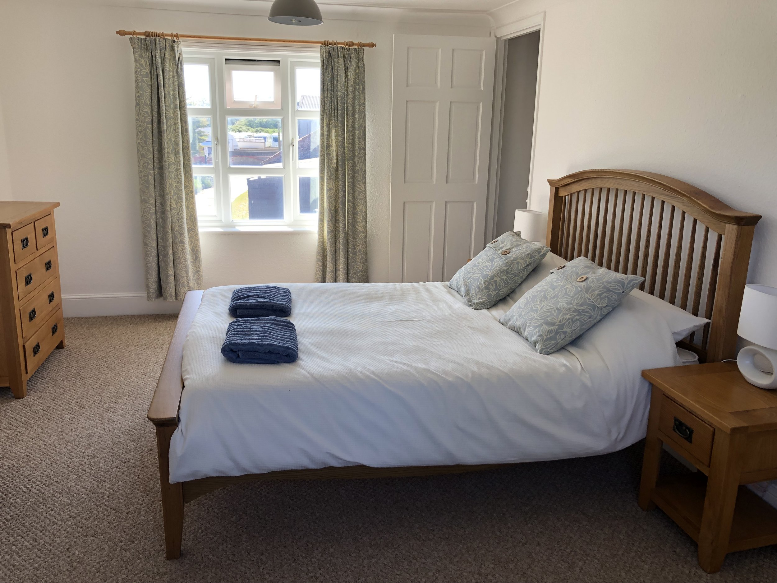 Master bedroom at West Cottage, Walnut Farm Waxham