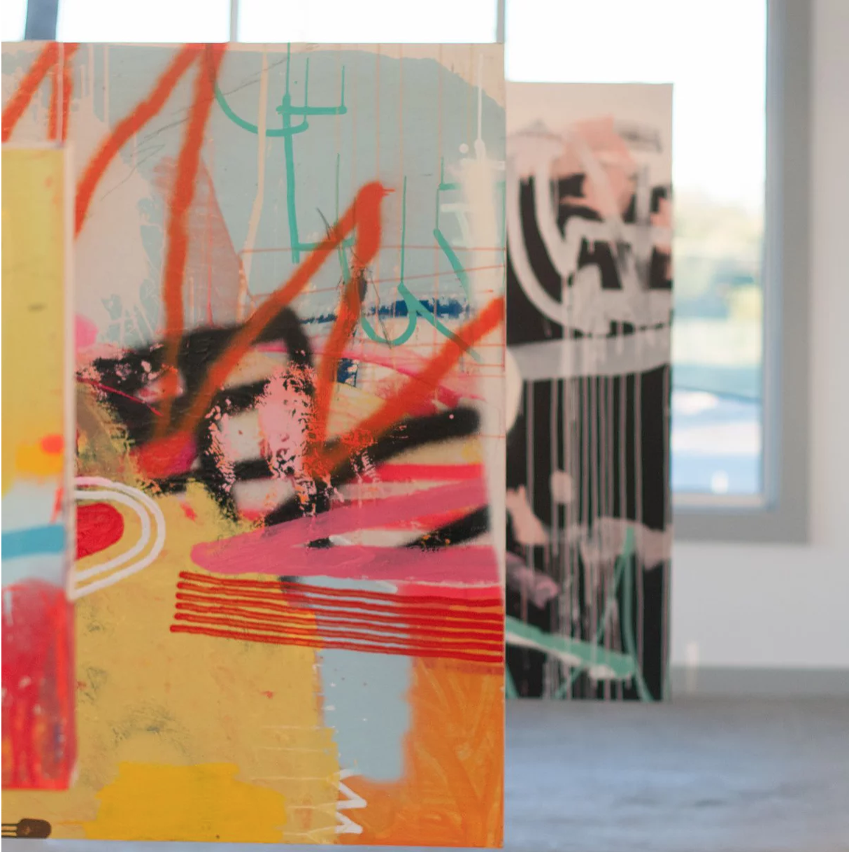 American Painting Now looks at Contemporary artists who work in the medium of paint. Each artists work in the exhibition is distinct and holds an ethos all their own. Adnan Razvi’s diverse body of work includes graffiti based pieces mixing elements of popular American culture and stereotypical imagery of Muslim culture, as well as newer works featuring calligraphic elements in layered patterns. Works by Jacques Seronde reference that of abstract expressionism, twining together aesthetics of Hans Hoffman, Robert Motherwell, and mixing them with the layered visuality of a Robert Rauschenberg. Alex Brewer, who goes by the name of HENSE takes graffiti to a whole new level, from large scale commissions in which he completely transforms the facades of structures, to expansive works on stretched canvas, each dripping with brilliant bolts of color and abstracted and irregular patterns. The work of these artists, while all distinctive, all engage in an environment of conviviality, signifying a return to the medium of painting, which has waned in popularity over the last two decades in favor of installation and conceptual art exhibitions.