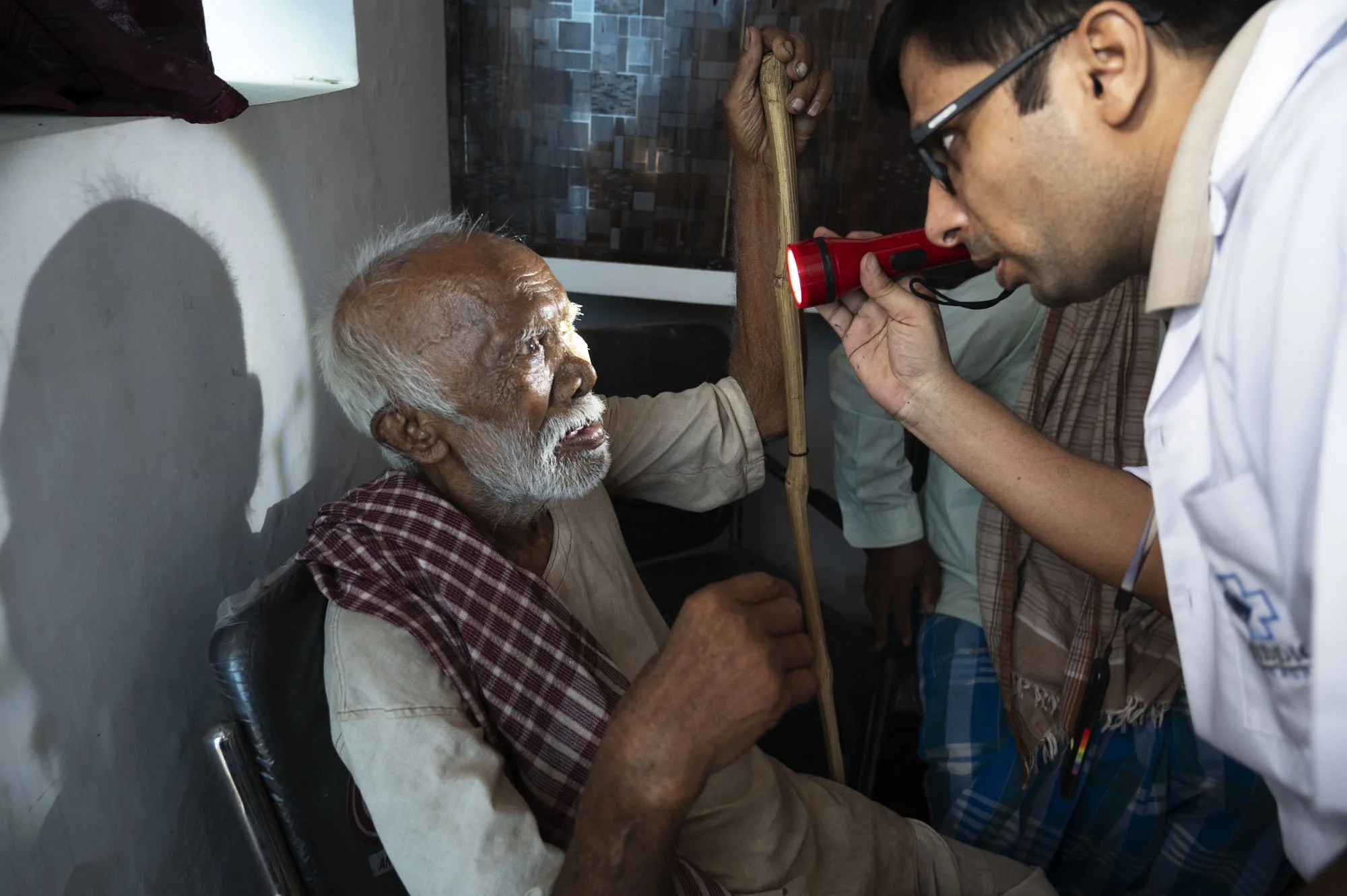 He has a milky white cataract which has reduced his vision to perception of light only