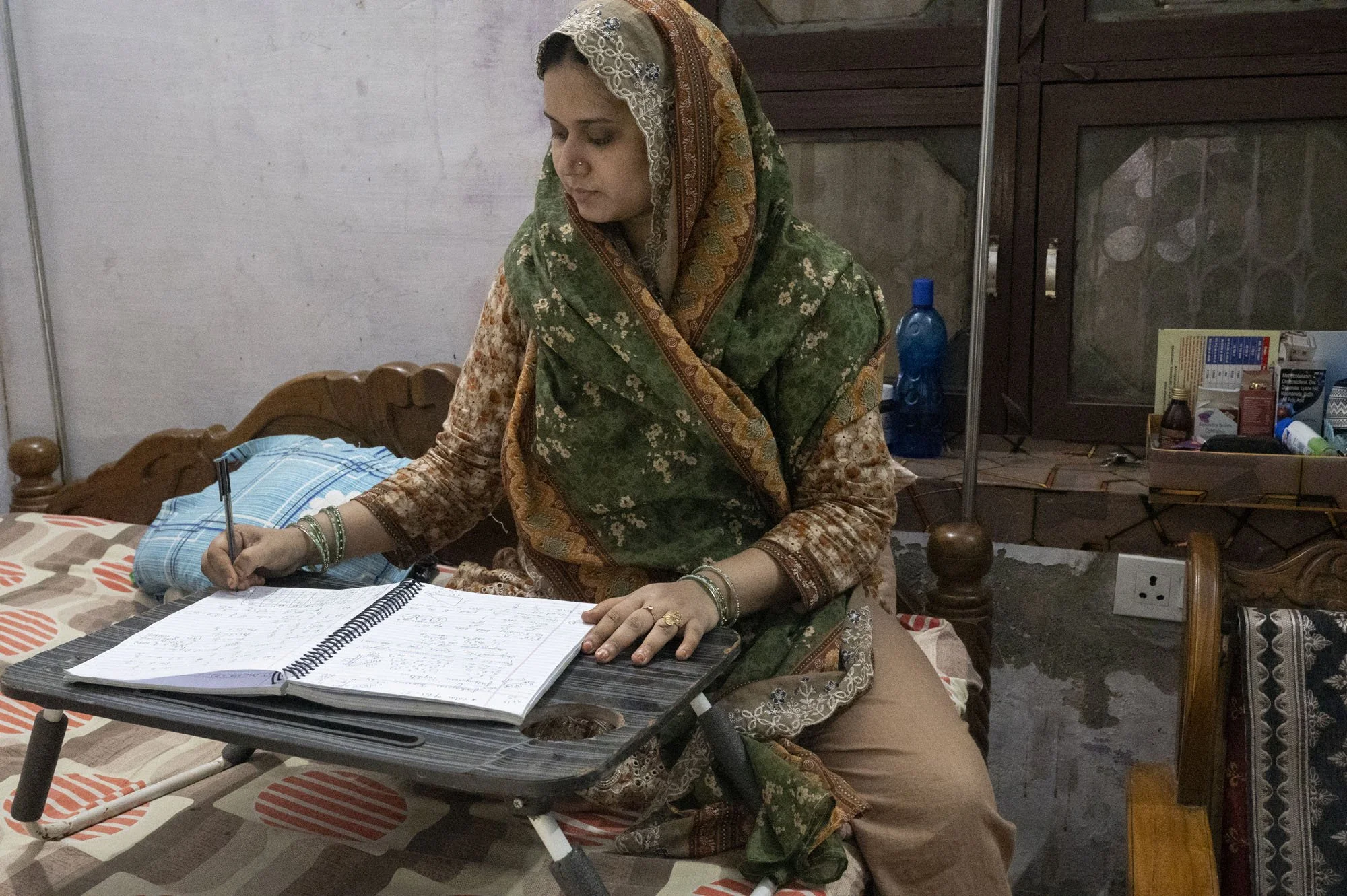 In between studying for her medical school entrance examination. Another multi-skilled worker at the DSN