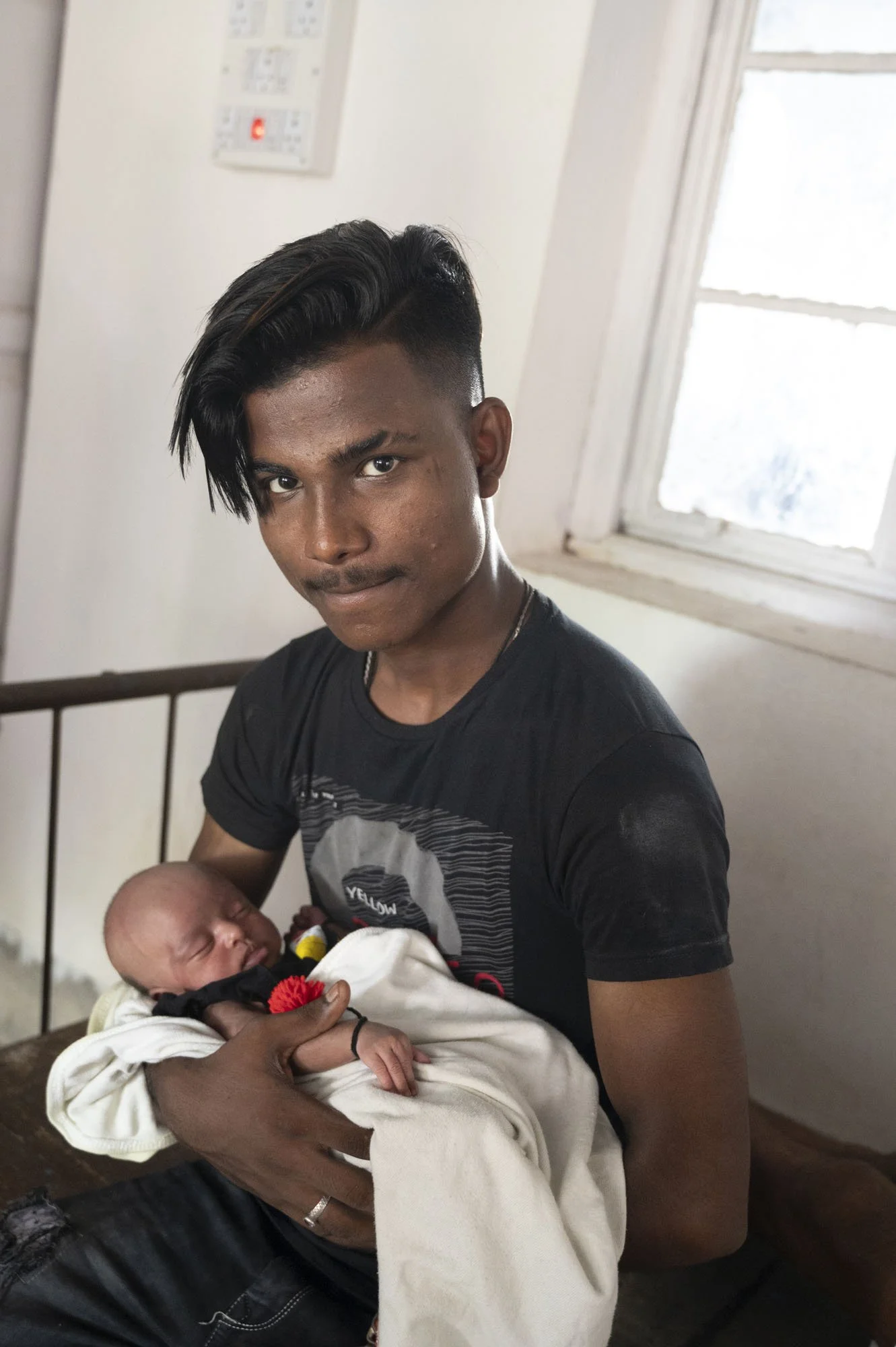 Father with baby closer.jpg