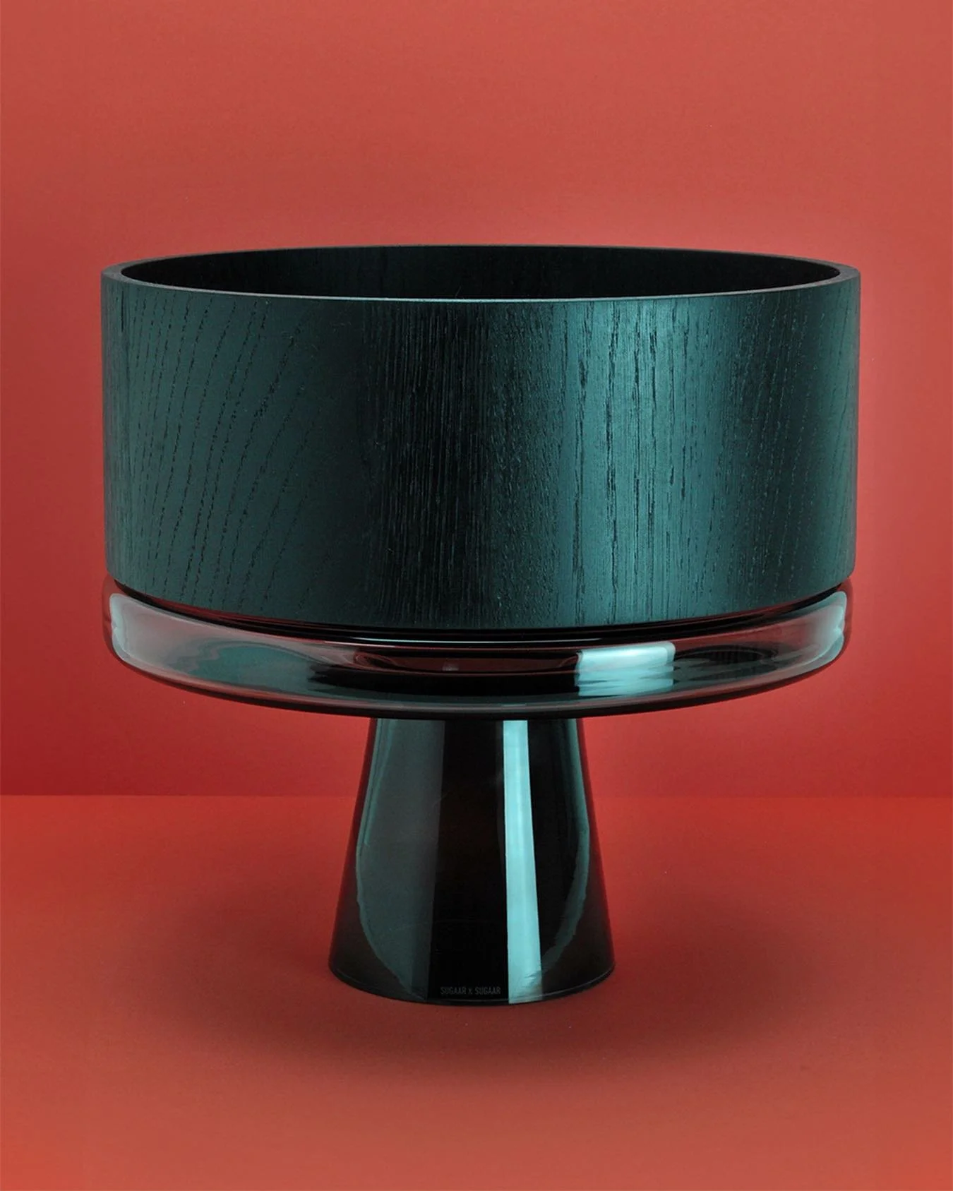 Dark wooden bowl with glass stand on a red background.
.
.
.
.
.
#sugaarandsugaar #glass #wood #glassblowing #woodcraft #art #design #bowl #stand #tray #smoke #black #red #luxury #luxurylifestyle #home #interior #tableware #glassware #deco #gift #gif