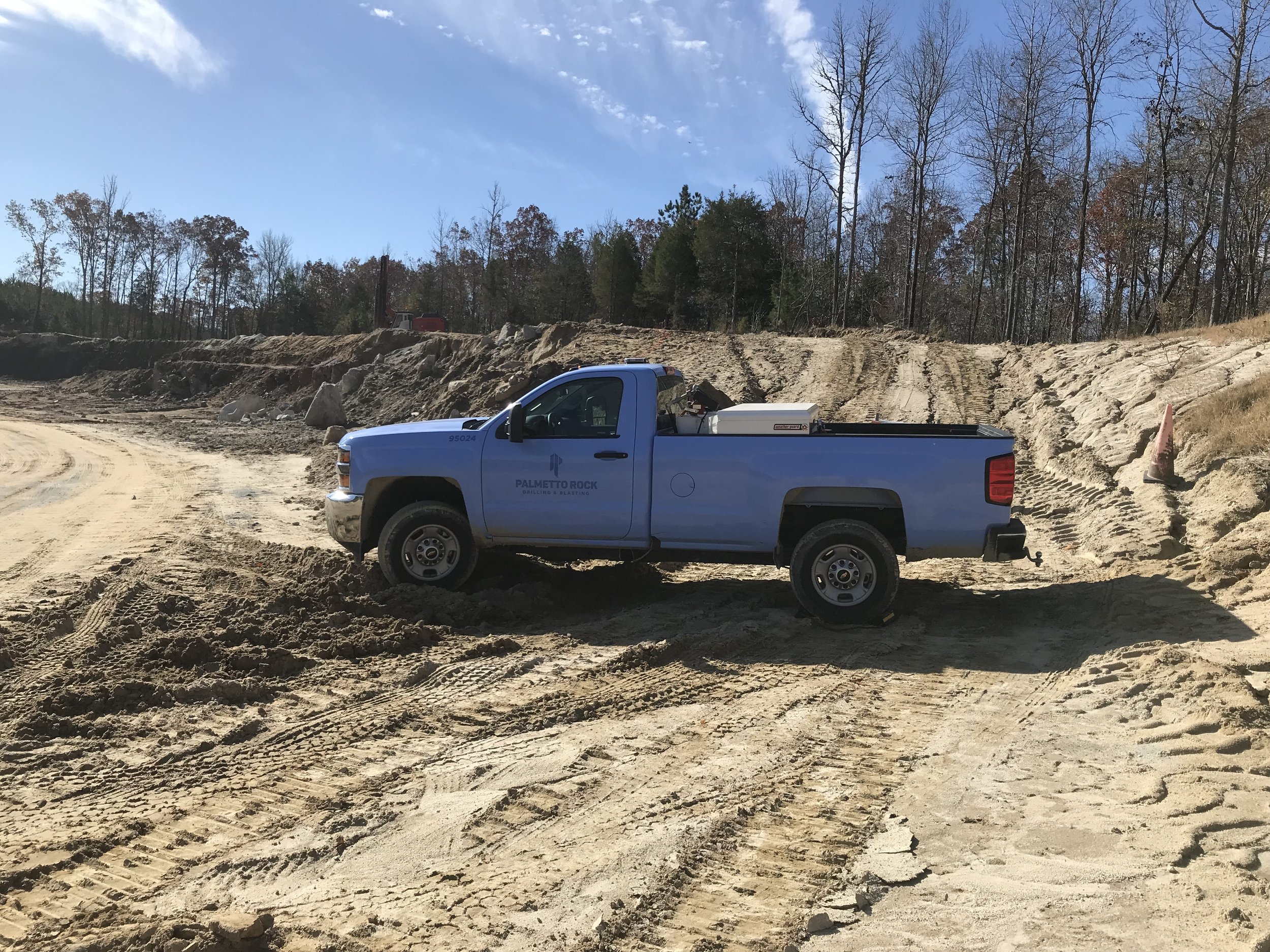 pickup truck in the dirt at a project site