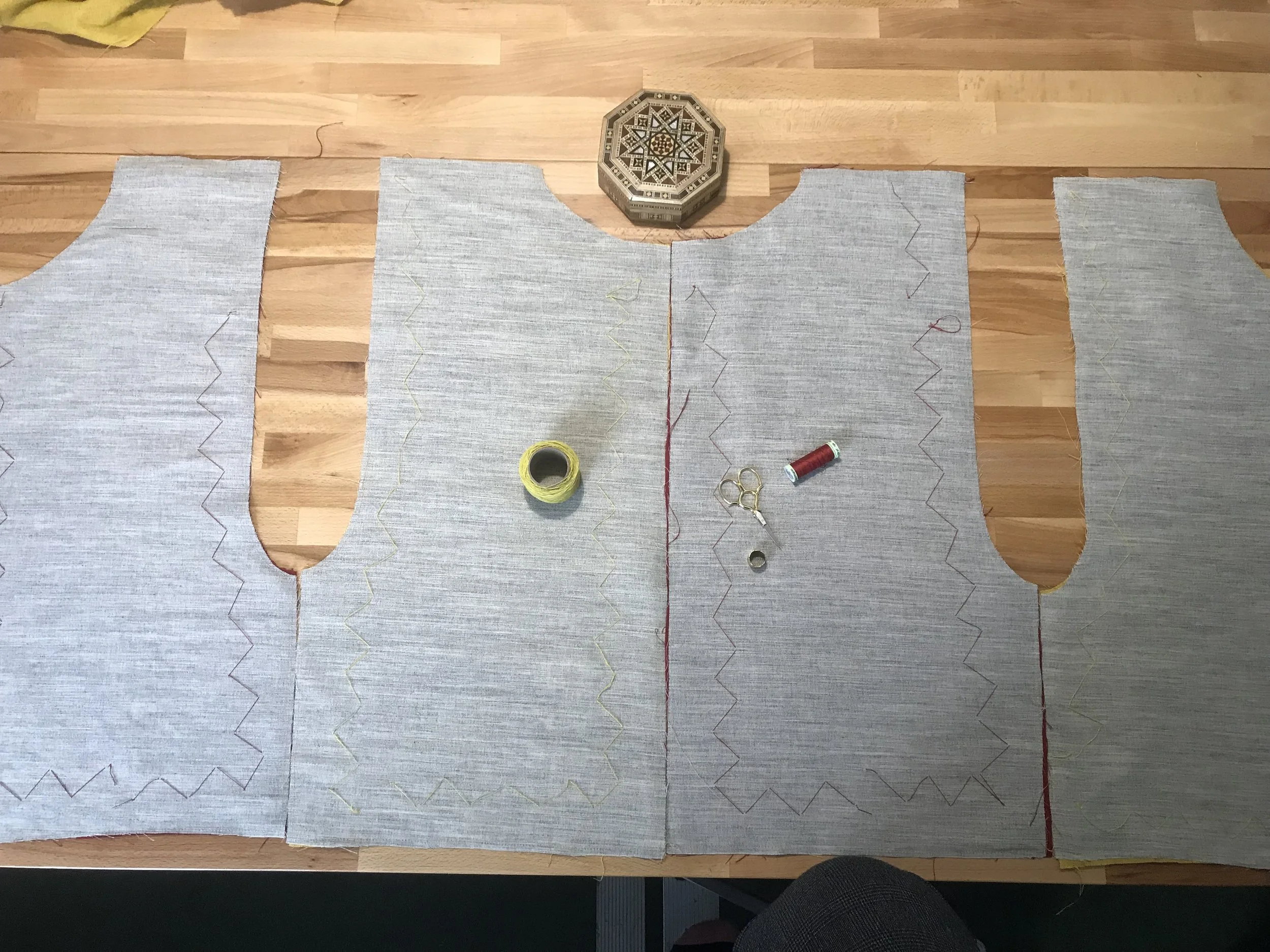 The interlining being pad stitched to the outer linen for strenth