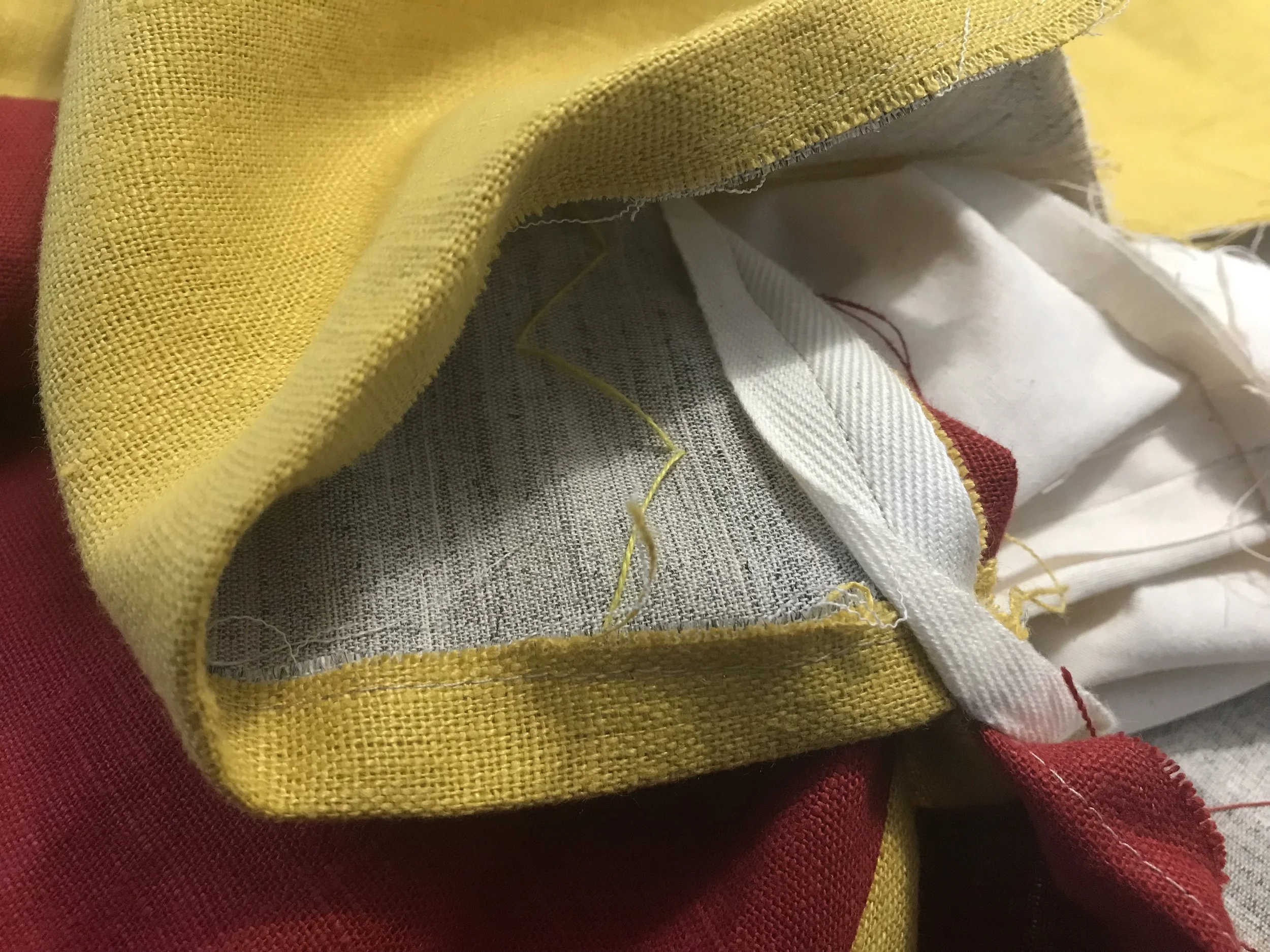 The tape strip around the quatered waist line - added for strength
