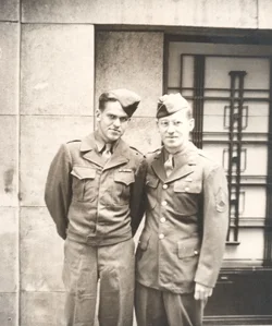 Private Donald “Drew Wilson” (on left) and his older brother Herschell, on leave together in Antwerp, Belgium, in the late Fall of 1944, just before my father was sent to fight in the Battle of the Bulge in December.