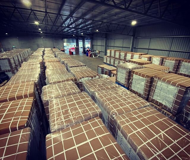 Strawberry coir bags all sitting pretty in our warehouse!
.
.
 It's a quick turn around in strawberries - we finish harvest early June, pull bags out, put new bags in, hydrate, plant over 1.3 million runners by mid July, then we breath,  continue to 