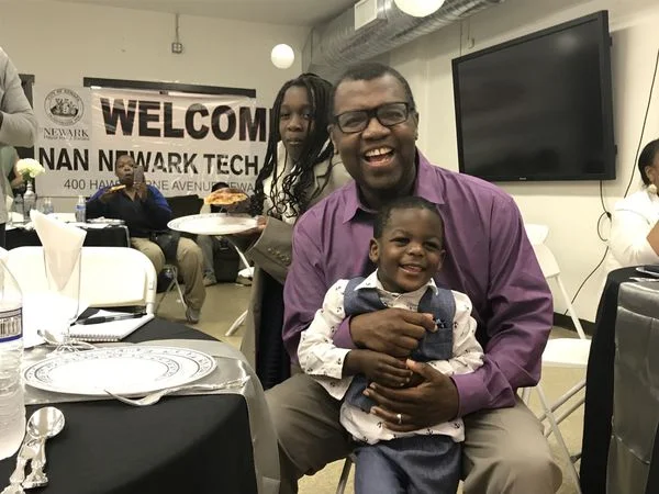 Seth Paraison and his son, Zihere, 4.