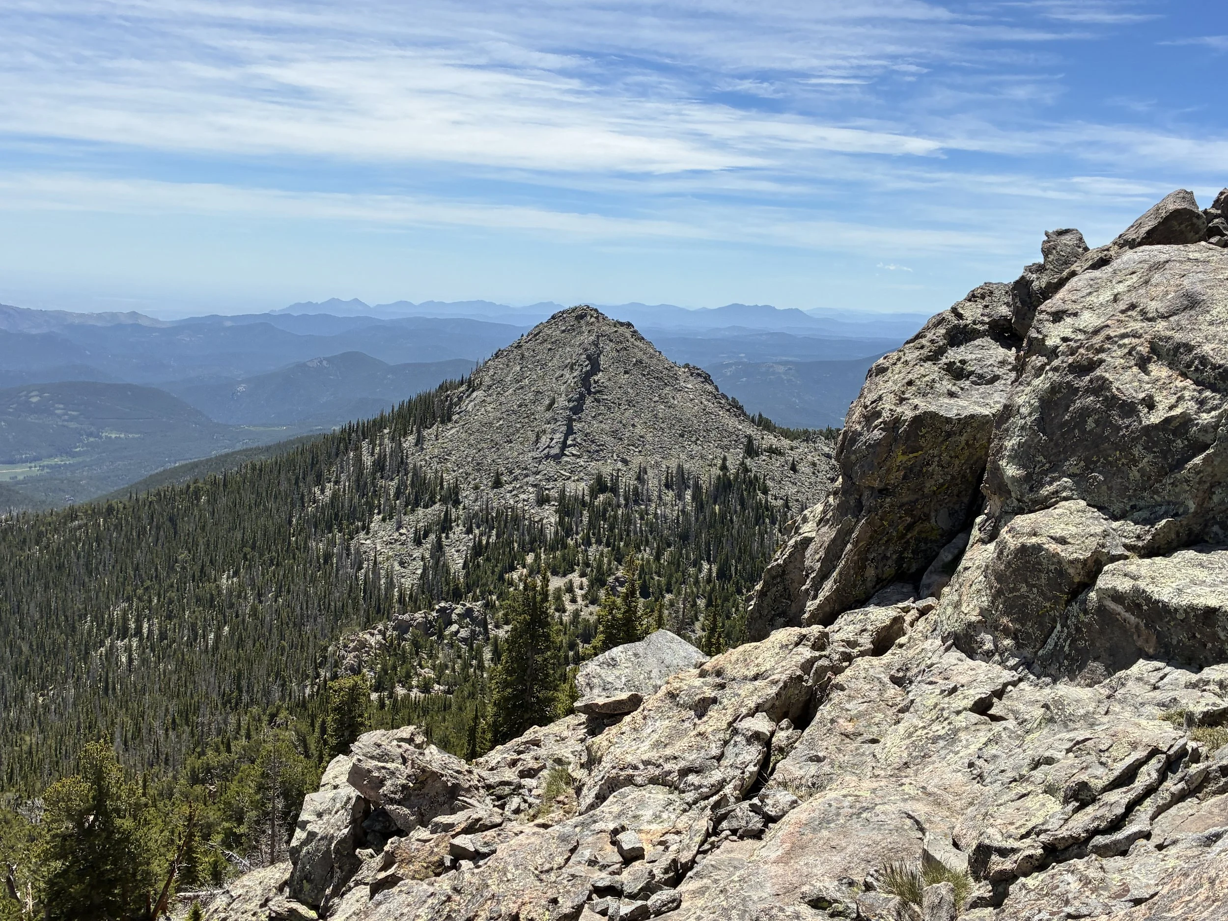 Boulder scrambling up to Twin Sisters Peak