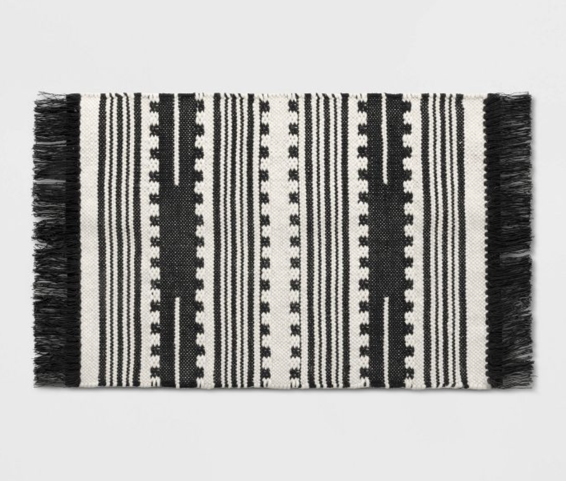 stripe woven rug.png
