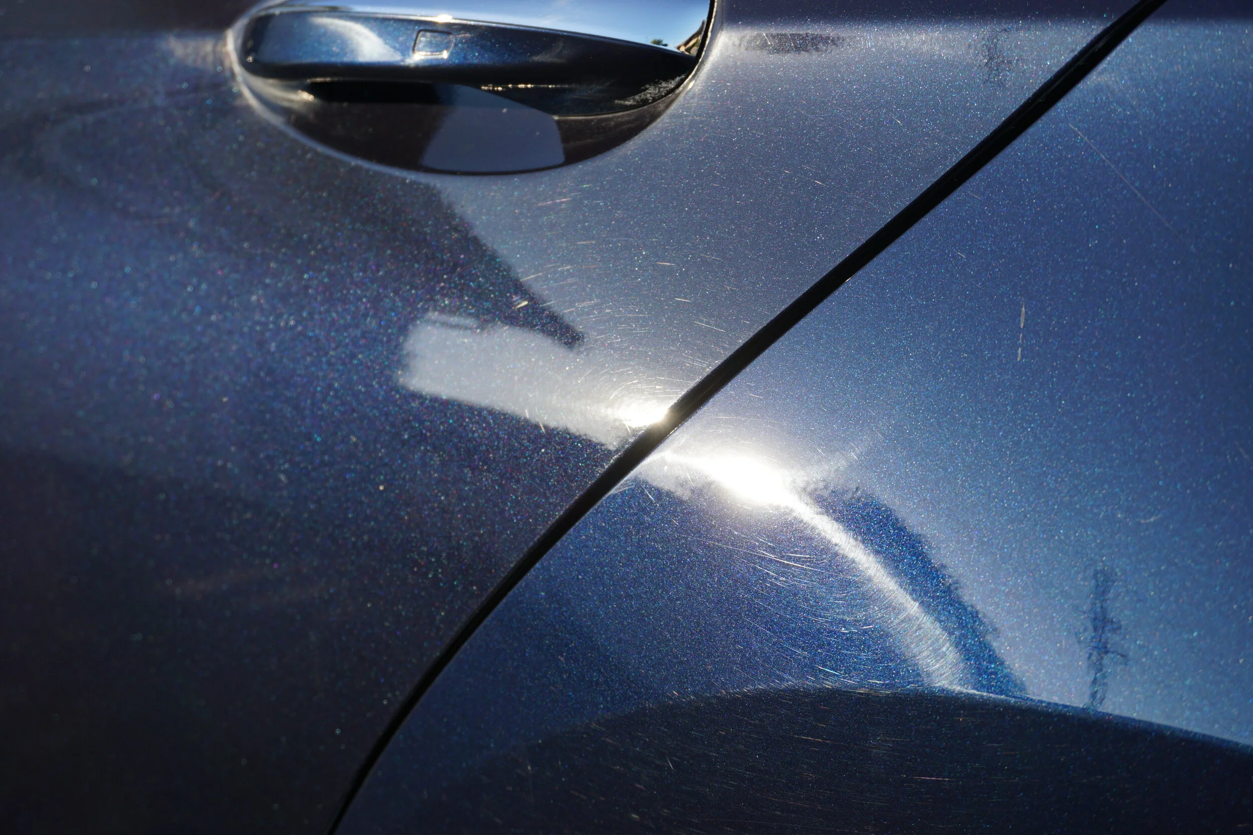 Mismatched painted left side doors with swirls and buffer trails/ holograms