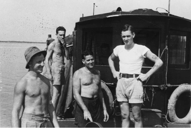 A group from Z Special Unit on board MV Krait during Operation Jaywick Left to right B3312 AB Andrew William George Huston RAN 66175 Major Ivan Lyon MBE The Gordon Highlanders officer commanding .jpg