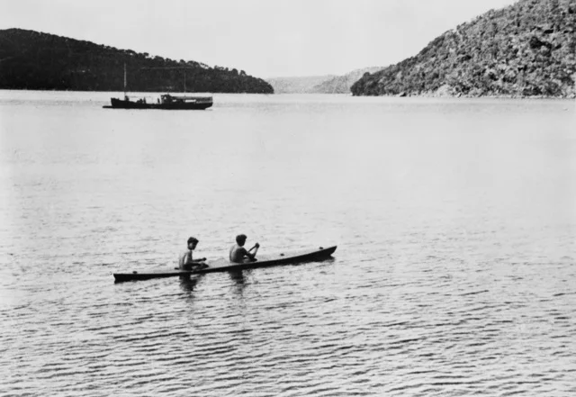 Leading Seaman Frederick W L Boof Marsh and Ordinary Seaman L K Tiny Hage of Z Special unit Australian Services Reconnaissance Department paddling a home made experimental two man canoe HMAS LYON a.jpg