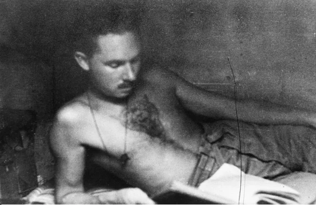 Ivan Lyons note the tiger tattoo on his hest.jpg