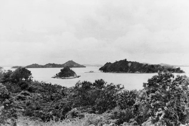 SINGAPORE STRAITS SETTLEMENTS 1943 09 ISLANDS SOUTH WEST OF SUBAR PHOTOGRAPHED FROM SUBAR ISLAND WHERE MEMBERS OF OPERATION JAYWICK Z SPECIAL UNIT AUSTRALIAN SERVICES RECONNAISSANCE DEPARTMENT CHANGED THEIR HIDI.jpg