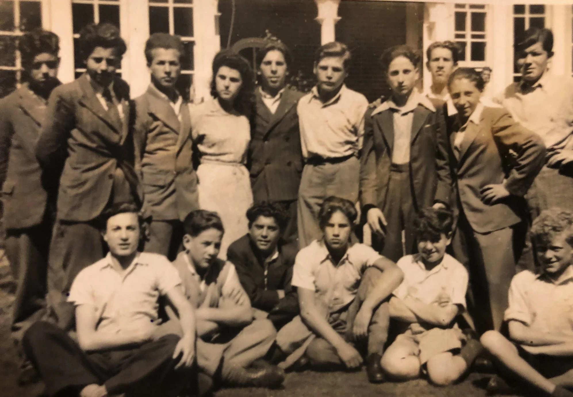 First row from left to right: Unknown, Nathan Rolnik, Sam Diament, Martin Baumel. Second row: forth from the left is Stella Silver who worked at the hostel; Third from the right is Benek Englard; second from the right is Joe Stone. The other boys in the image are unknown. Please tell us if you recognise them! Photo: Benek Englard.