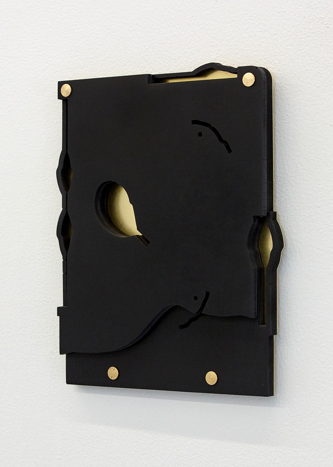 As If I Were (black), 2018 Jesmonite & brass 21.5 x 18 x 1.8cm Edition of 5