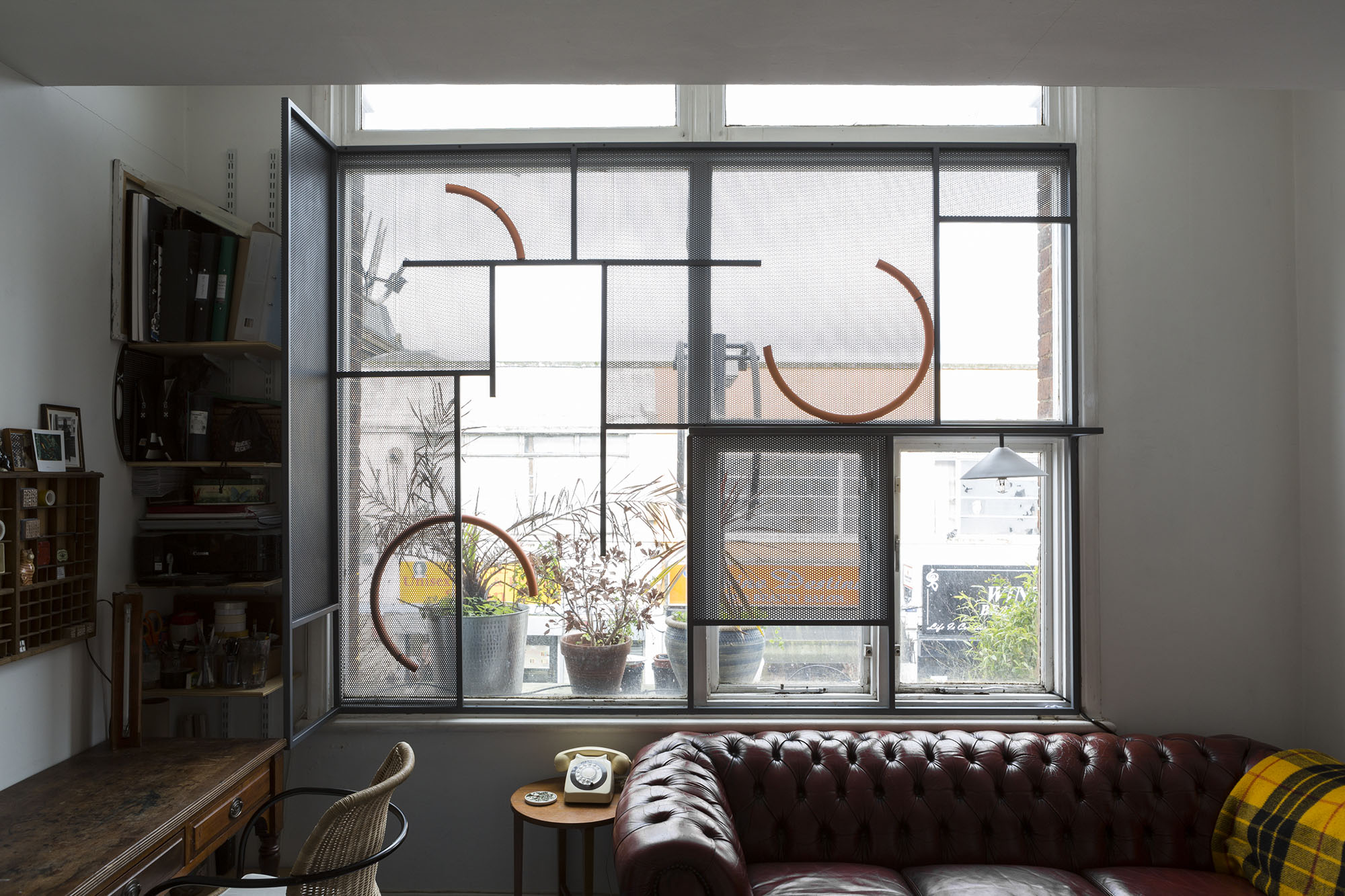 Window , 2014 Mild steel, plaster, lacquer, light bulb 