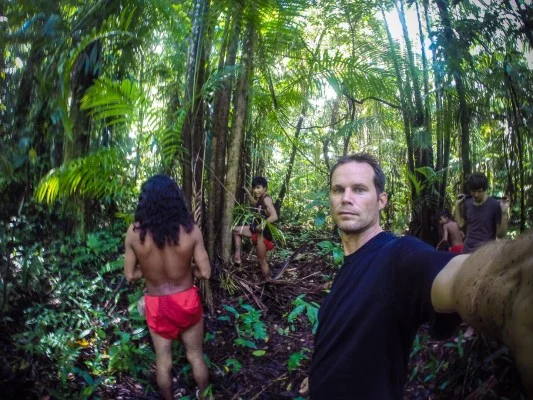 Jason (at right in the background) invited me along on a trip into the jungle with some of his Wayampi friend to find some açaí berries