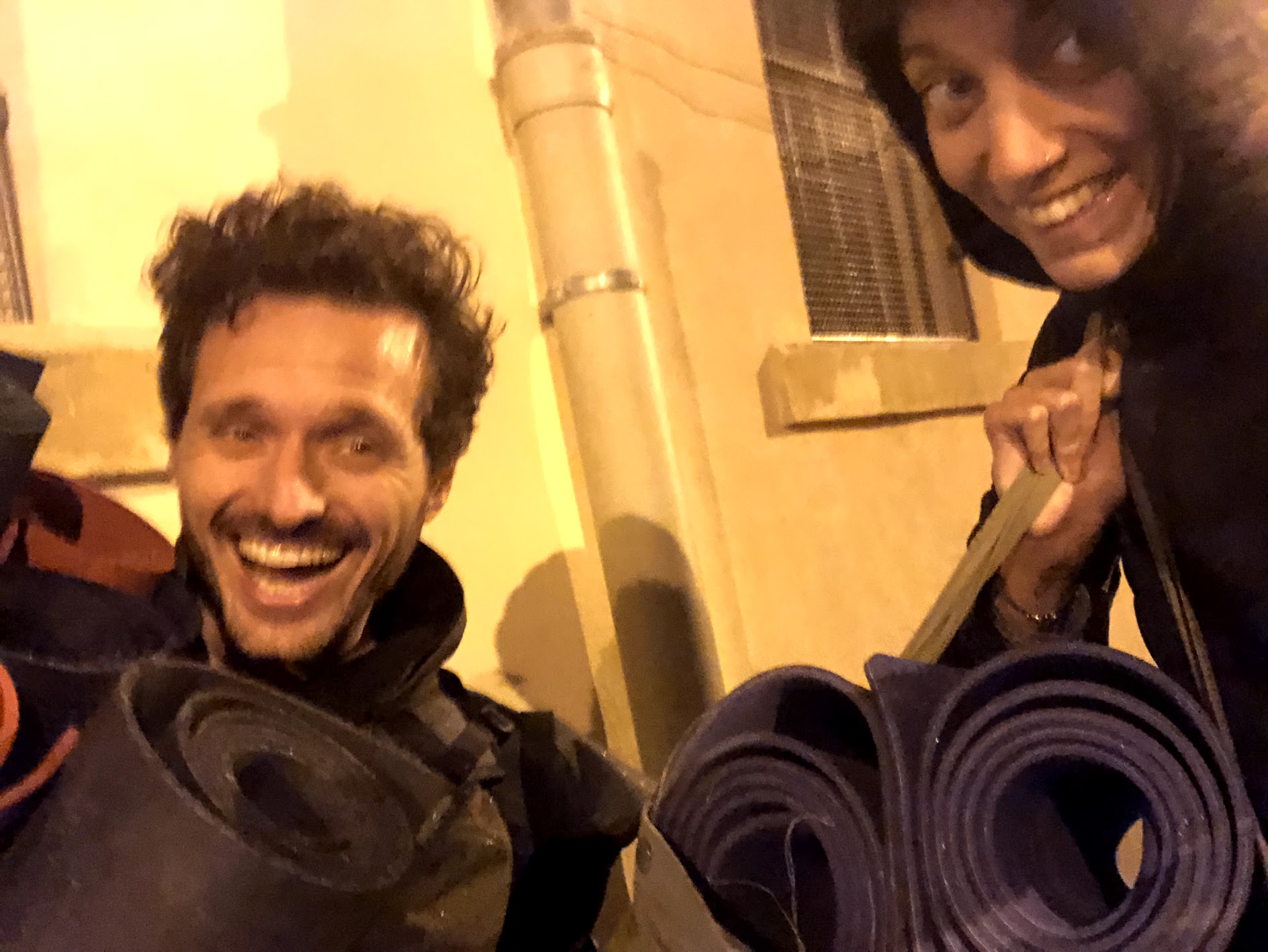 Carrying yoga mats for our weekly class with refugees! That night, it was cold and raining, and no one came to class. Some days were more difficult than others, but we tried to uphold each other to better face them!