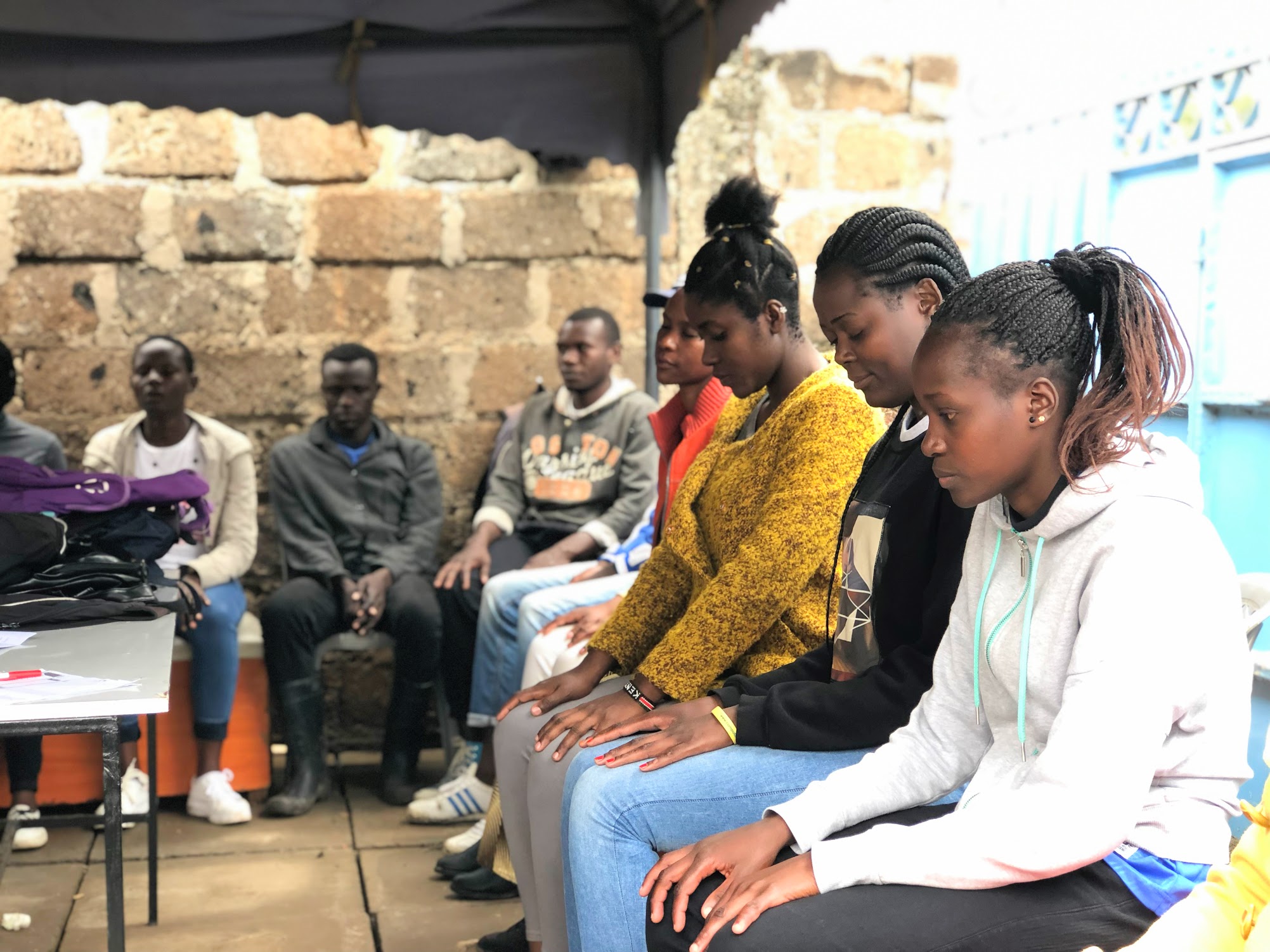 Our introductory yoga & meditation session with the young leaders of Vijana Amani Pamoja in their office in Nairobi