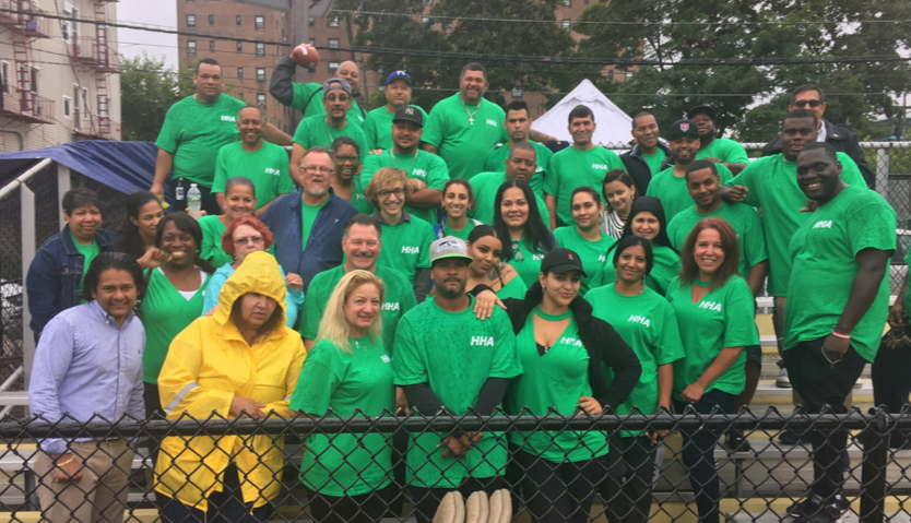 Staff_in_green.png