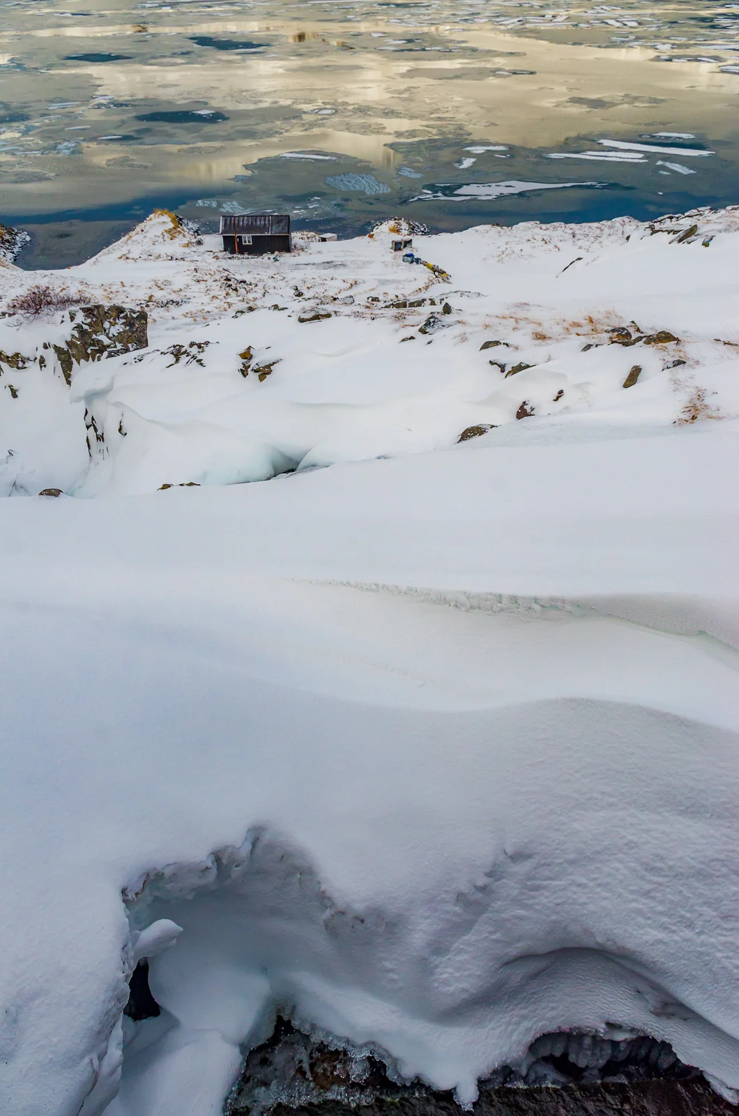 Balancing on the Edge of Snowbank - © Mike Best